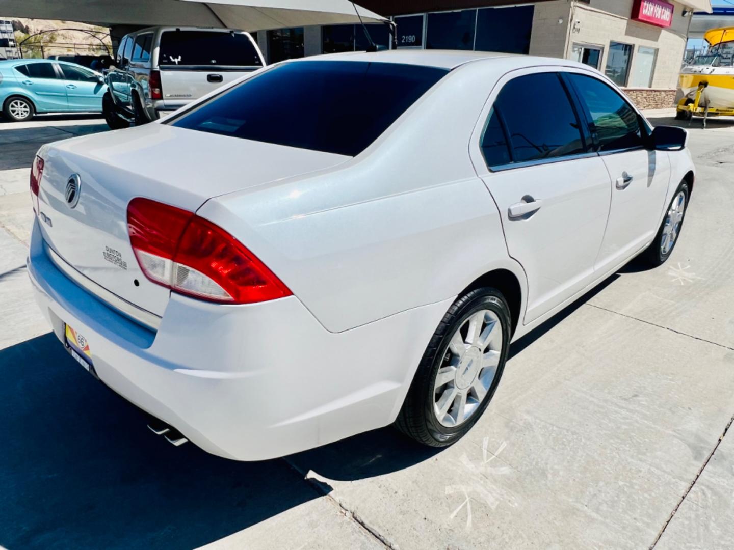 2010 White Mercury Milan I4 (3MEHM0HA0AR) with an 2.5L L4 DOHC 16V engine, AUTOMATIC transmission, located at 2190 Hwy 95, Bullhead City, AZ, 86442, (928) 704-0060, 0.000000, 0.000000 - 2010 Mercury Milan. only 80k miles. 2.5 I4 engine. Great gas mileage. Free warranty. In house financing available. c - Photo#1