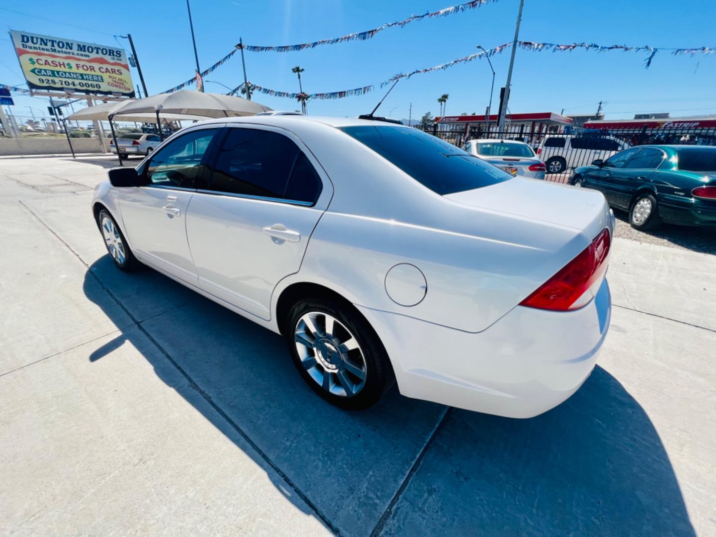 2010 White Mercury Milan I4 (3MEHM0HA0AR) with an 2.5L L4 DOHC 16V engine, AUTOMATIC transmission, located at 2190 Hwy 95, Bullhead City, AZ, 86442, (928) 704-0060, 0.000000, 0.000000 - 2010 Mercury Milan. only 80k miles. 2.5 I4 engine. Great gas mileage. Free warranty. In house financing available. c - Photo#3