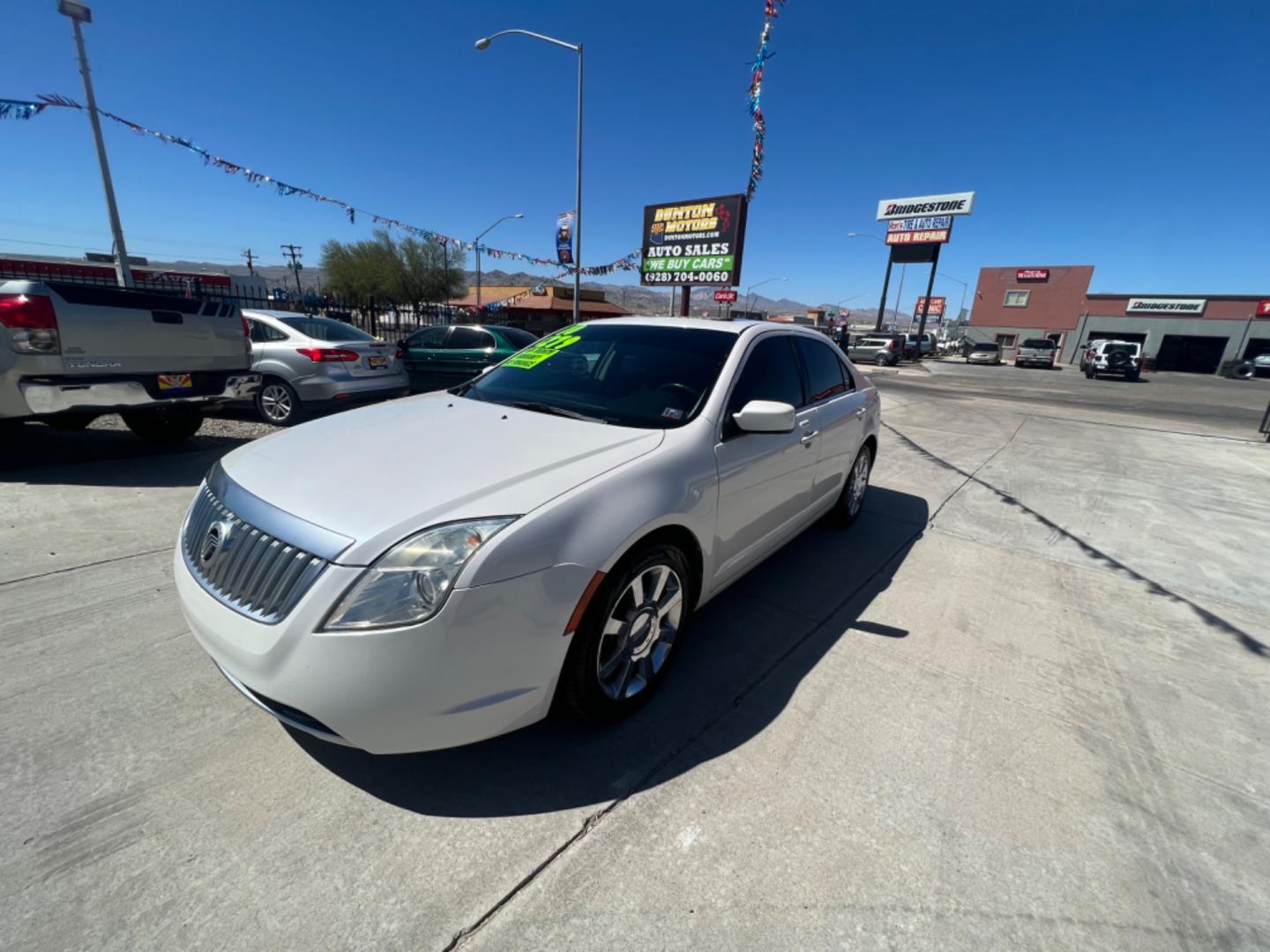 2010 White Mercury Milan I4 (3MEHM0HA0AR) with an 2.5L L4 DOHC 16V engine, AUTOMATIC transmission, located at 2190 Hwy 95, Bullhead City, AZ, 86442, (928) 704-0060, 0.000000, 0.000000 - 2010 Mercury Milan. only 80k miles. 2.5 I4 engine. Great gas mileage. Free warranty. In house financing available. c - Photo#7