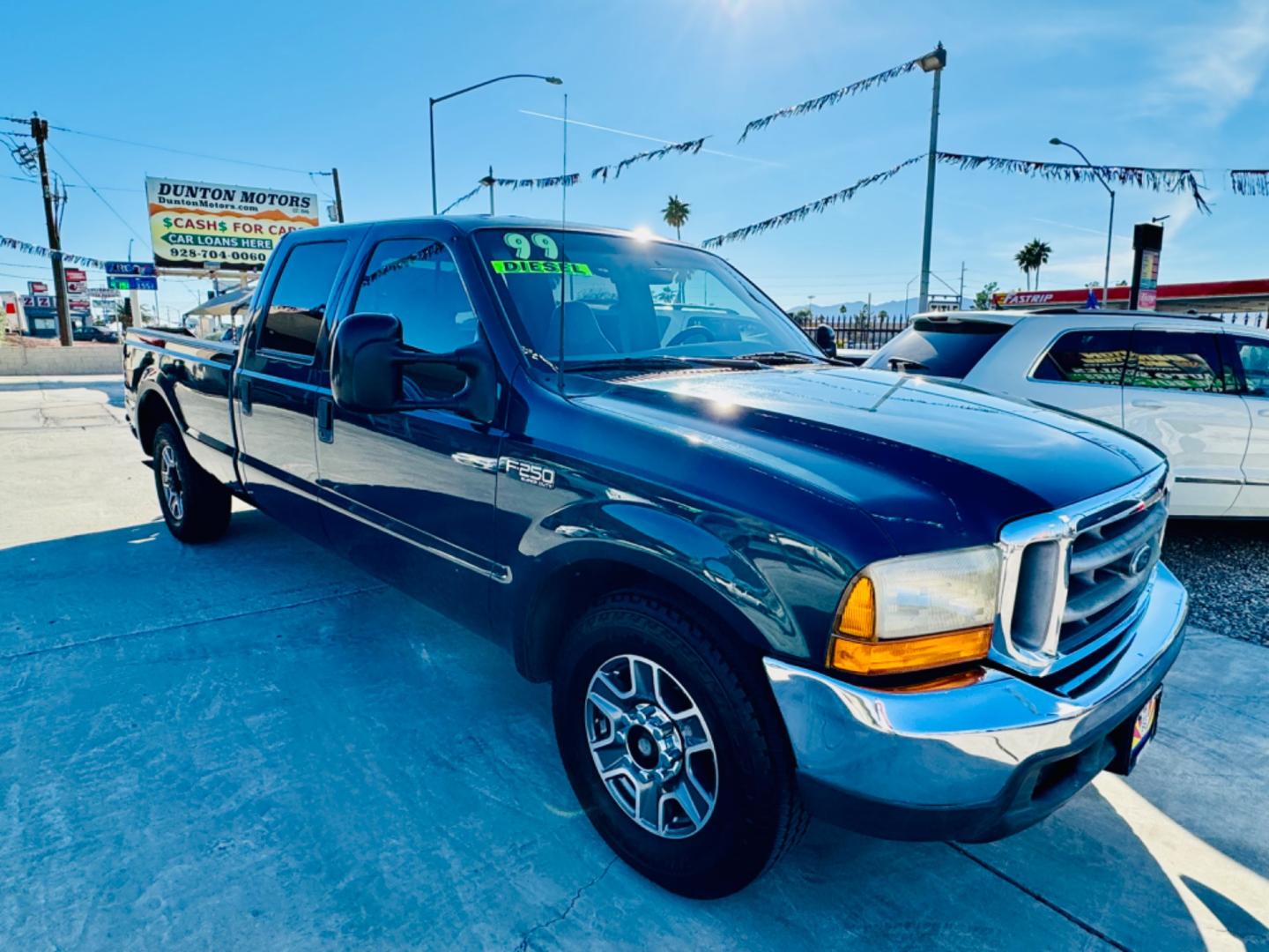 1999 Green Ford F-250 SD Lariat Crew Cab LWB 2WD (1FTNW20F4XE) with an 7.3L V8 OHV 16V TURBO DIESEL engine, located at 2190 Hwy 95, Bullhead City, AZ, 86442, (928) 704-0060, 0.000000, 0.000000 - 1999 Ford F250 crew cab long bed 7.3 powerstroke diesel. seats 6. fresh new paint. new window tint. brand new stereo with bluetooth. Completely serviced, lots of new parts. new ac system Ice cold a/c. runs and drives great. financing available. - Photo#7