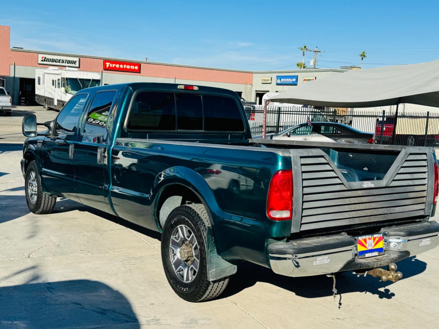 1999 Green Ford F-250 SD Lariat Crew Cab LWB 2WD (1FTNW20F4XE) with an 7.3L V8 OHV 16V TURBO DIESEL engine, located at 2190 Hwy 95, Bullhead City, AZ, 86442, (928) 704-0060, 0.000000, 0.000000 - 1999 Ford F250 crew cab long bed 7.3 powerstroke diesel. seats 6. fresh new paint. new window tint. brand new stereo with bluetooth. Completely serviced, lots of new parts. new ac system Ice cold a/c. runs and drives great. financing available. - Photo#10