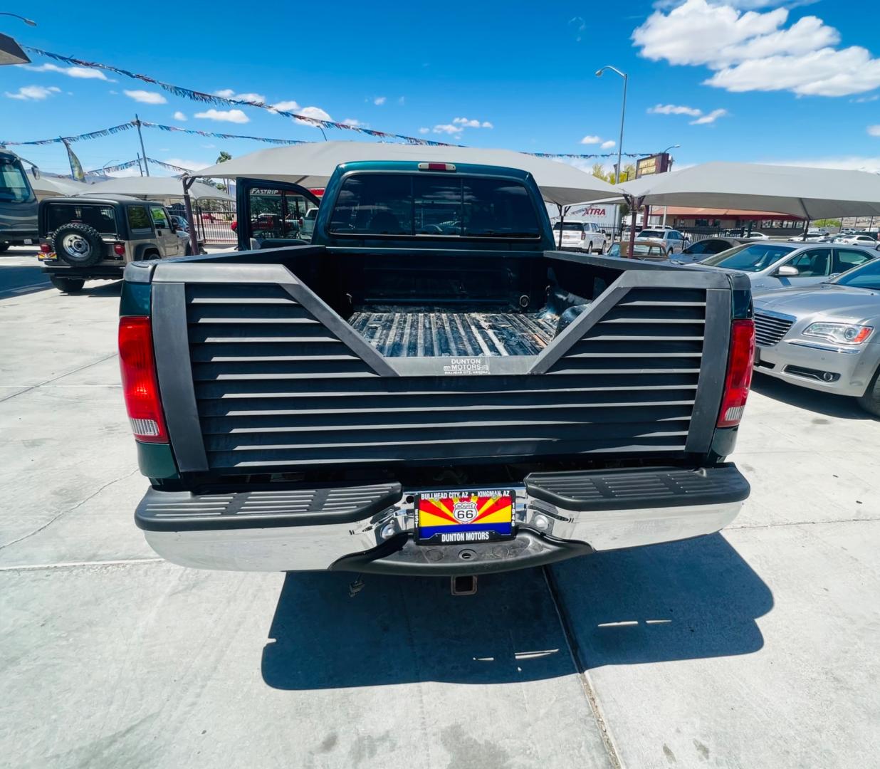 1999 Green Ford F-250 SD Lariat Crew Cab LWB 2WD (1FTNW20F4XE) with an 7.3L V8 OHV 16V TURBO DIESEL engine, located at 2190 Hwy 95, Bullhead City, AZ, 86442, (928) 704-0060, 0.000000, 0.000000 - 1999 Ford F250 crew cab long bed 7.3 powerstroke diesel. seats 6. fresh new paint. new window tint. brand new stereo with bluetooth. Completely serviced, lots of new parts. new ac system Ice cold a/c. runs and drives great. financing available. - Photo#4