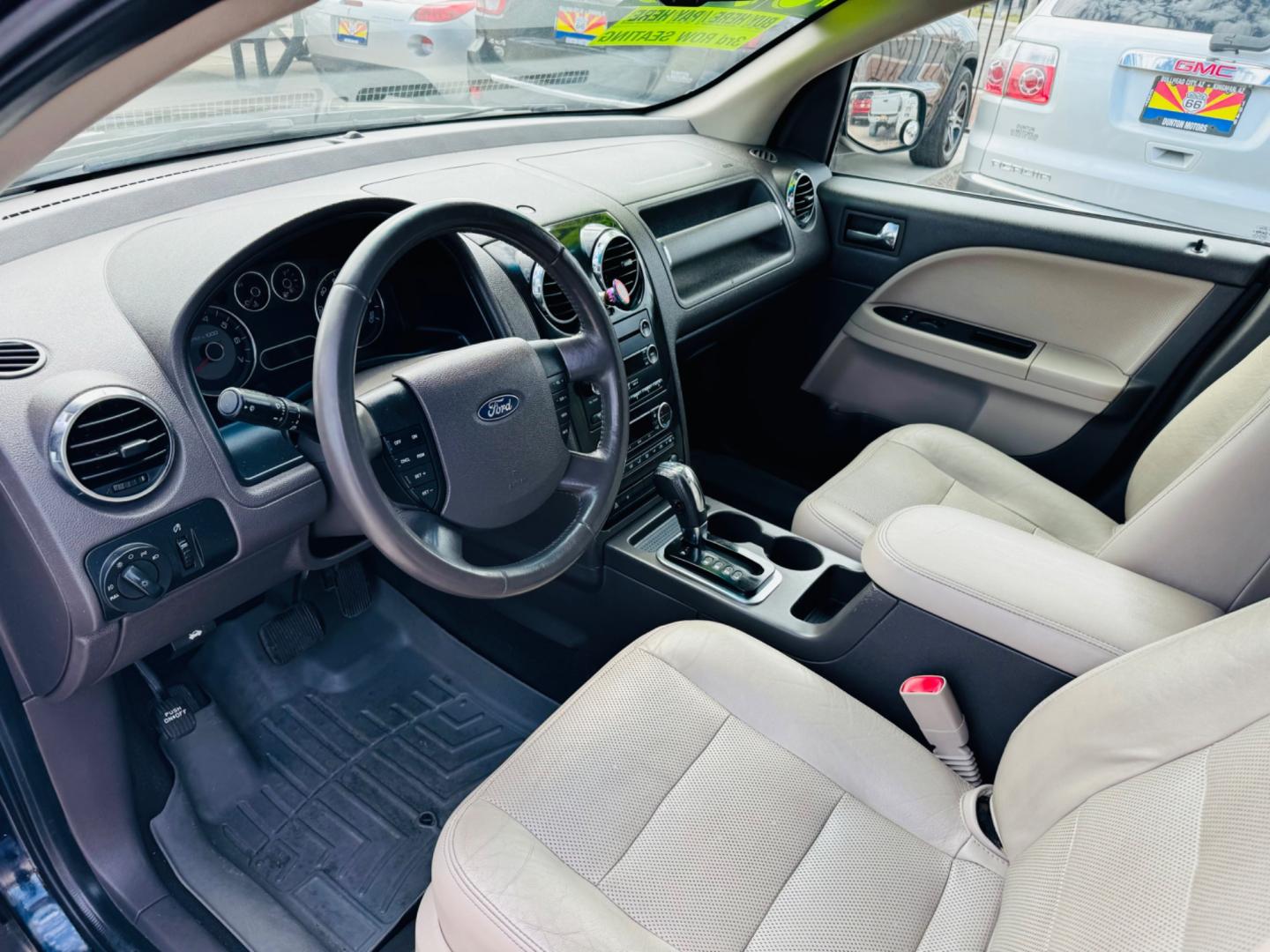 2008 Blue Ford Taurus X SEL AWD (1FMDK05W18G) with an 3.5L V6 DOHC 24V engine, 6-Speed Automatic Overdrive transmission, located at 2190 Hwy 95, Bullhead City, AZ, 86442, (928) 704-0060, 0.000000, 0.000000 - 2008 ford Taurus X SEL. All wheel drive. 3rd row.cold ac. Leather, in house financing. Completely serviced. New tires. New windshield. Free warranty. Buy here pay here. 2 owner clean carfax. - Photo#13