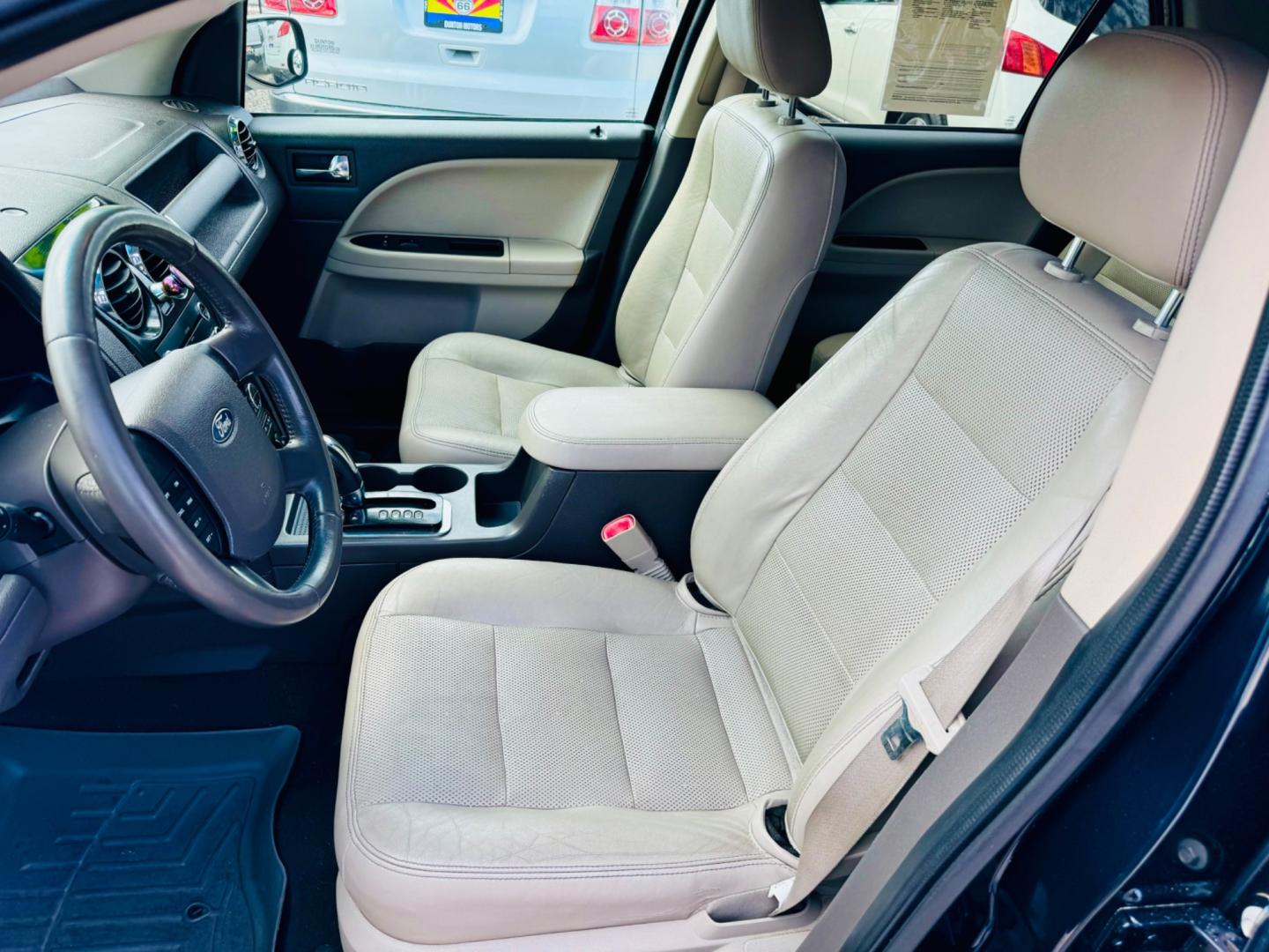 2008 Blue Ford Taurus X SEL AWD (1FMDK05W18G) with an 3.5L V6 DOHC 24V engine, 6-Speed Automatic Overdrive transmission, located at 2190 Hwy 95, Bullhead City, AZ, 86442, (928) 704-0060, 0.000000, 0.000000 - 2008 ford Taurus X SEL. All wheel drive. 3rd row.cold ac. Leather, in house financing. Completely serviced. New tires. New windshield. Free warranty. Buy here pay here. 2 owner clean carfax. - Photo#14