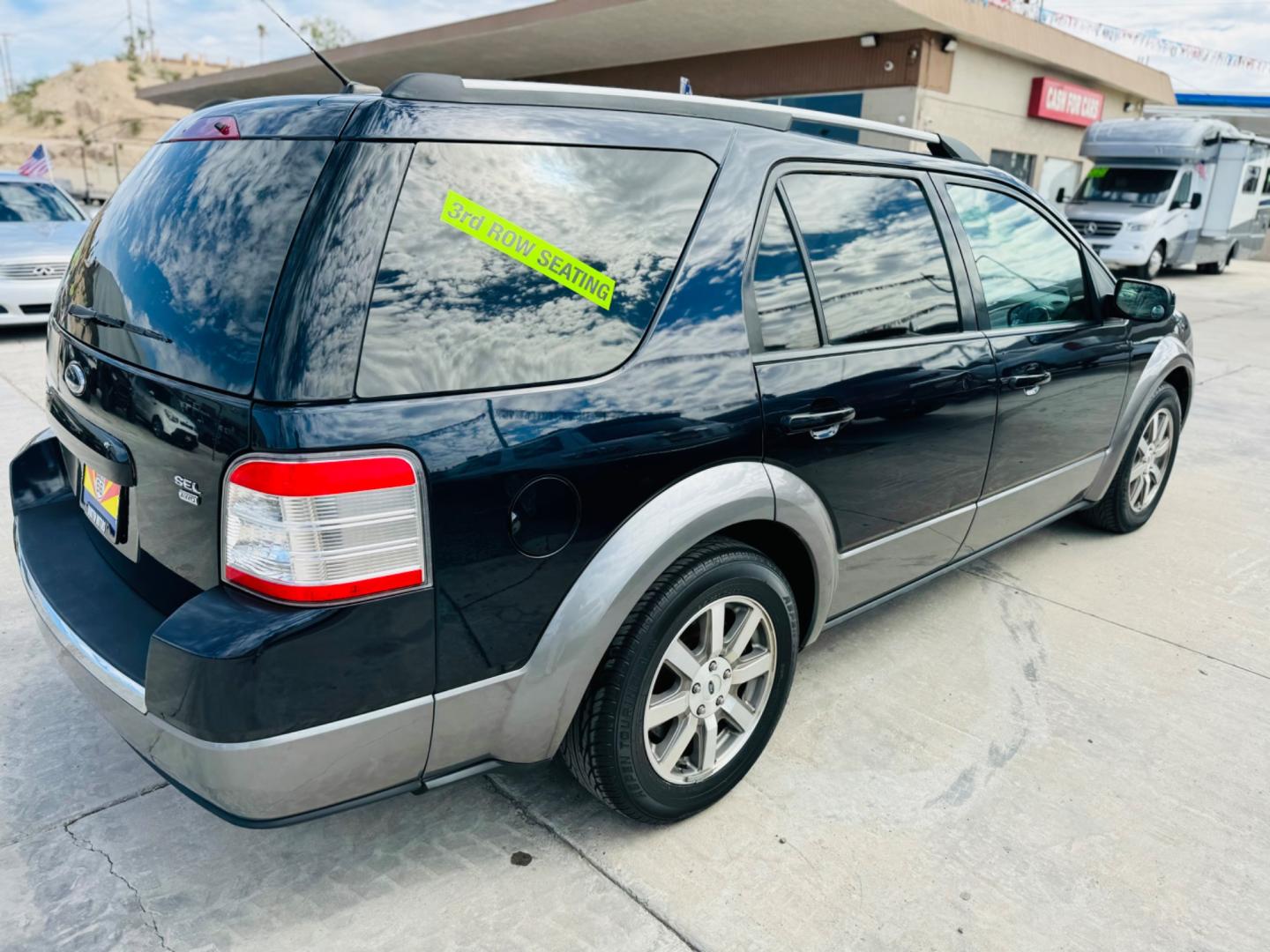 2008 Blue Ford Taurus X SEL AWD (1FMDK05W18G) with an 3.5L V6 DOHC 24V engine, 6-Speed Automatic Overdrive transmission, located at 2190 Hwy 95, Bullhead City, AZ, 86442, (928) 704-0060, 0.000000, 0.000000 - 2008 ford Taurus X SEL. All wheel drive. 3rd row.cold ac. Leather, in house financing. Completely serviced. New tires. New windshield. Free warranty. Buy here pay here. 2 owner clean carfax. - Photo#4