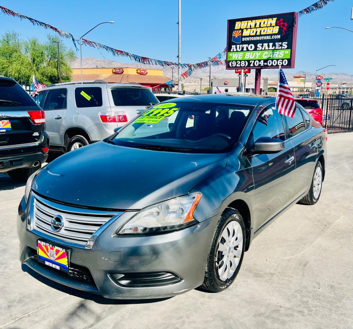 2015 Nissan Sentra S 6MT (3N1AB7AP7FY) with an 1.8L L4 SFI DOHC 16V engine, automatic transmission, located at 2190 Hwy 95, Bullhead City, AZ, 86442, (928) 704-0060, 0.000000, 0.000000 - Photo#2