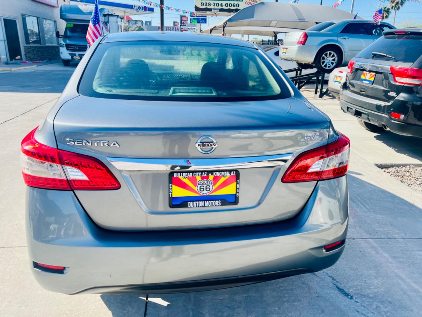 2015 Nissan Sentra S 6MT (3N1AB7AP7FY) with an 1.8L L4 SFI DOHC 16V engine, automatic transmission, located at 2190 Hwy 95, Bullhead City, AZ, 86442, (928) 704-0060, 0.000000, 0.000000 - Photo#5