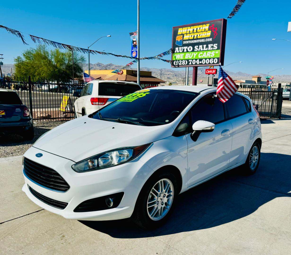 2014 White Ford Fiesta SE Hatchback (3FADP4EJ3EM) with an 1.6L L4 DOHC 16V engine, manual transmission, located at 2190 Hwy 95, Bullhead City, AZ, 86442, (928) 704-0060, 0.000000, 0.000000 - Photo#0