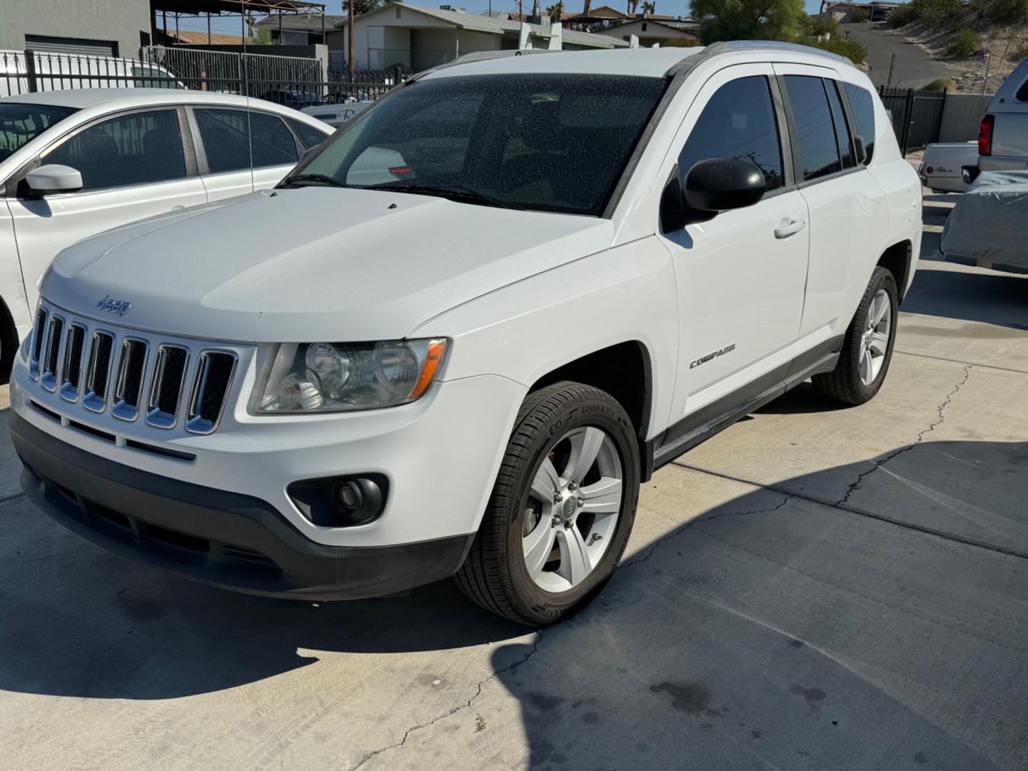 2013 White Jeep Compass , located at 2190 Hwy 95, Bullhead City, AZ, 86442, (928) 704-0060, 0.000000, 0.000000 - 2013 jeep compass. 120k . automatic. loaded. free carfax. free warranty. 120k miles - Photo#0