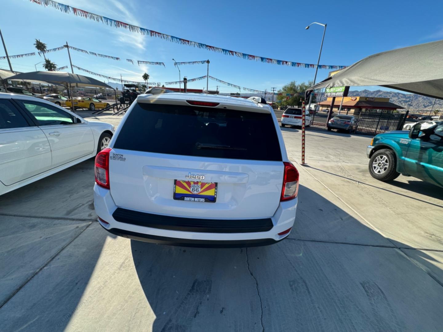 2013 White Jeep Compass , located at 2190 Hwy 95, Bullhead City, AZ, 86442, (928) 704-0060, 0.000000, 0.000000 - 2013 jeep compass. 120k . automatic. loaded. free carfax. free warranty. 120k miles - Photo#7