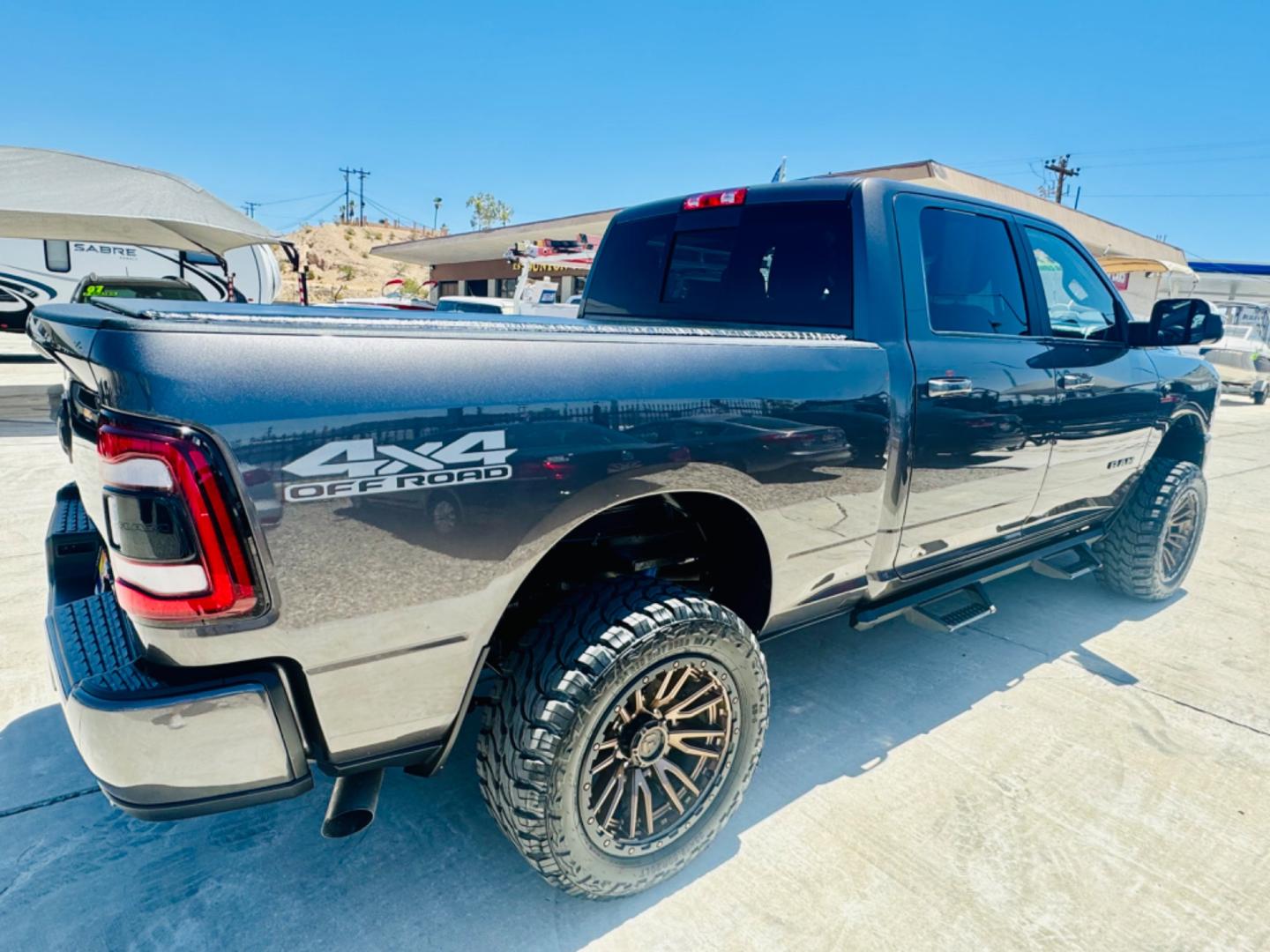 2020 grey RAM 2500 (3C6UR5DLXLG) , located at 2190 Hwy 95, Bullhead City, AZ, 86442, (928) 704-0060, 0.000000, 0.000000 - 2020 Ram 2500 crew cab short bed diesel 4x4. *1 owner. excellent condition. Custom tires and wheels, excellent condition. Big horn edition. 20 in wheels. tow package. bed liner and soft cover. needs nothing. Free and clear title. on consignment. - Photo#3