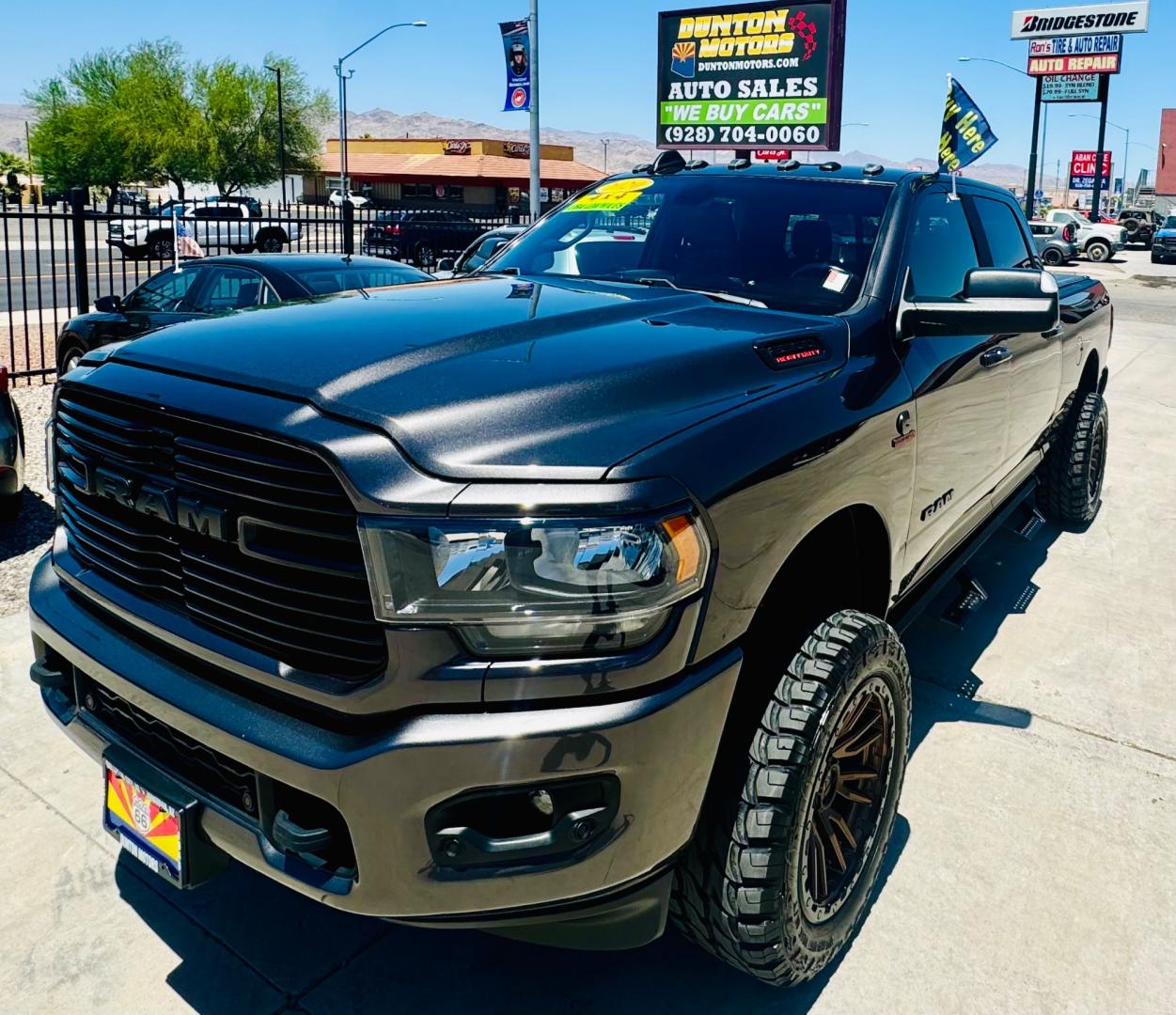 2020 grey RAM 2500 (3C6UR5DLXLG) , located at 2190 Hwy 95, Bullhead City, AZ, 86442, (928) 704-0060, 0.000000, 0.000000 - 2020 Ram 2500 crew cab short bed diesel 4x4. *1 owner. excellent condition. Custom tires and wheels, excellent condition. Big horn edition. 20 in wheels. tow package. bed liner and soft cover. needs nothing. Free and clear title. on consignment. - Photo#8