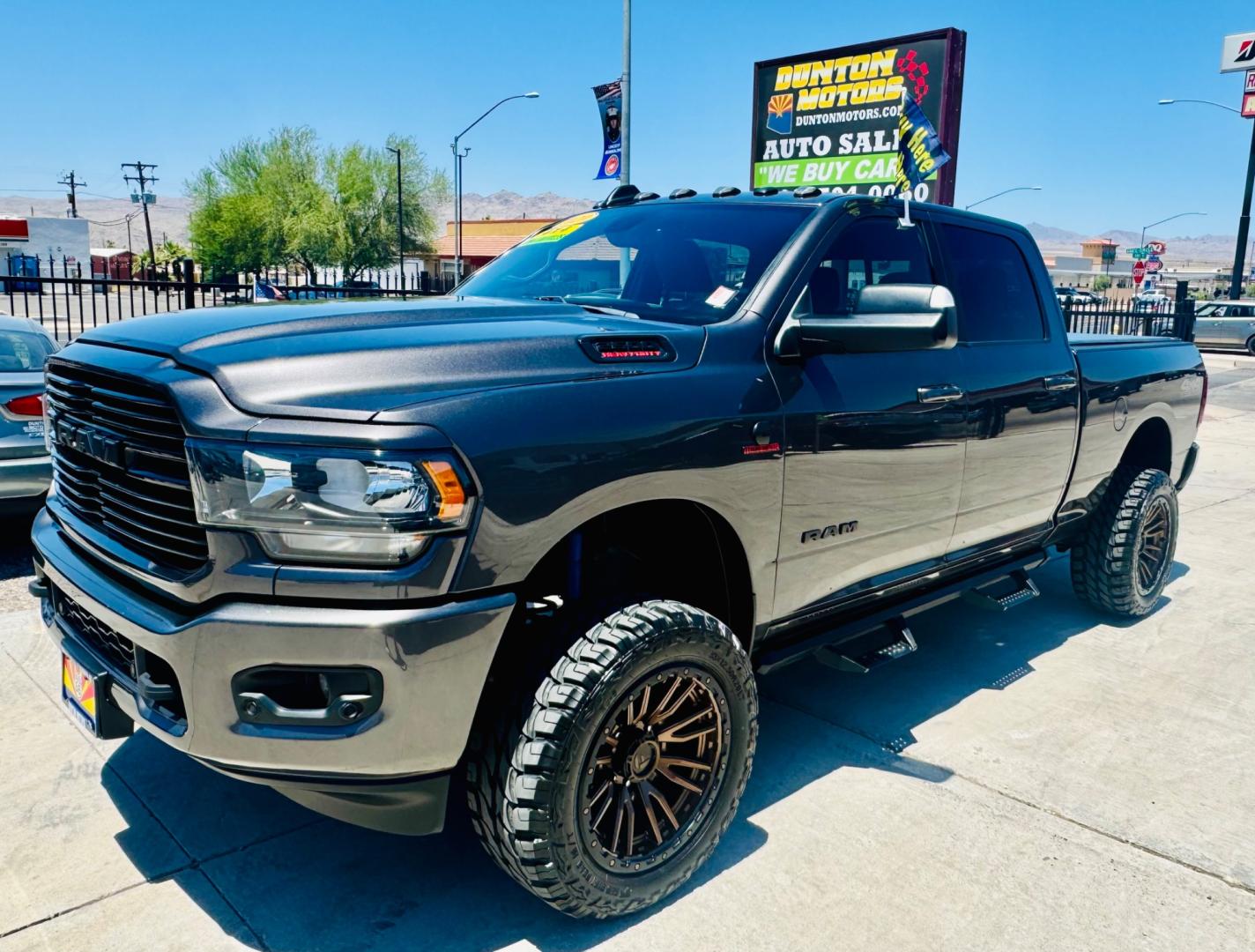 2020 grey RAM 2500 (3C6UR5DLXLG) , located at 2190 Hwy 95, Bullhead City, AZ, 86442, (928) 704-0060, 0.000000, 0.000000 - 2020 Ram 2500 crew cab short bed diesel 4x4. *1 owner. excellent condition. Custom tires and wheels, excellent condition. Big horn edition. 20 in wheels. tow package. bed liner and soft cover. needs nothing. Free and clear title. on consignment. - Photo#7