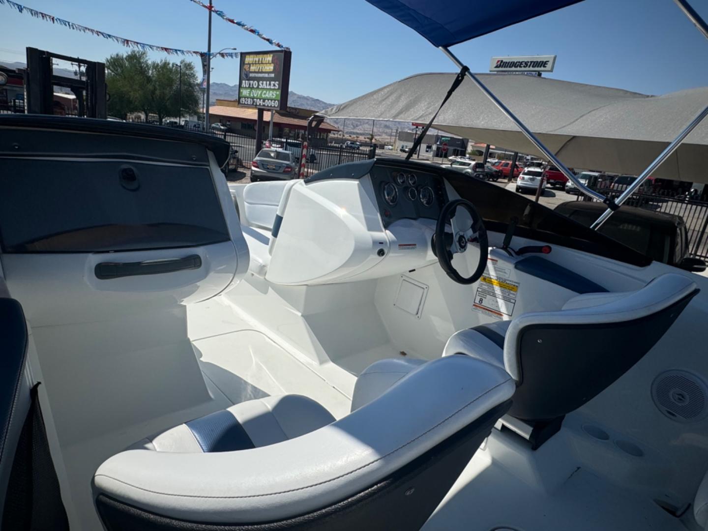 2005 White /white/blue Sea Doo Challenger 180 , located at 2190 Hwy 95, Bullhead City, AZ, 86442, (928) 704-0060, 0.000000, 0.000000 - on consignment. 2005 Sea Doo Challenger 180. 18ft with 4 tech 4 stroke engine. runs and drives great. only 86 hours. That's right 86 hours on the engine. Recently serviced. newer bimini top . stereo custom decals. spare tire. free and clear title for boat and trailer. - Photo#3