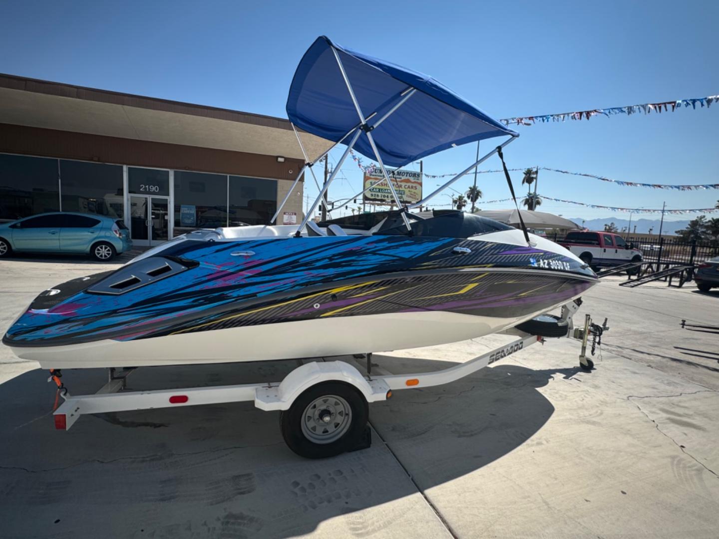 2005 White /white/blue Sea Doo Challenger 180 , located at 2190 Hwy 95, Bullhead City, AZ, 86442, (928) 704-0060, 0.000000, 0.000000 - on consignment. 2005 Sea Doo Challenger 180. 18ft with 4 tech 4 stroke engine. runs and drives great. only 86 hours. That's right 86 hours on the engine. Recently serviced. newer bimini top . stereo custom decals. spare tire. free and clear title for boat and trailer. - Photo#7