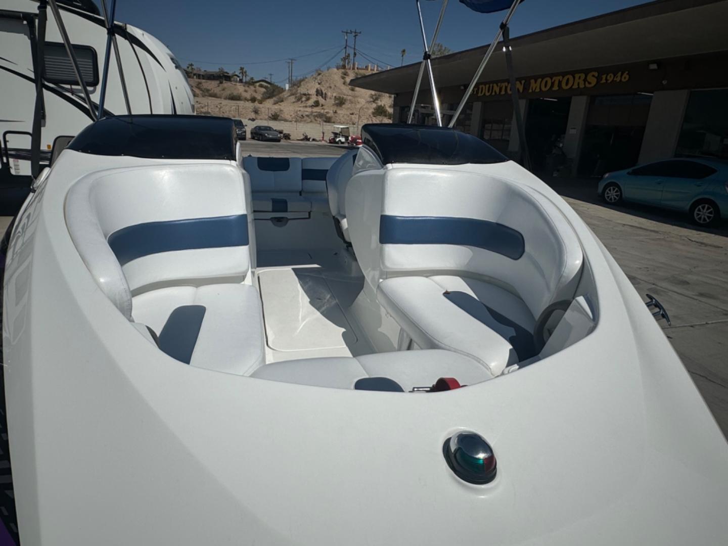 2005 White /white/blue Sea Doo Challenger 180 , located at 2190 Hwy 95, Bullhead City, AZ, 86442, (928) 704-0060, 0.000000, 0.000000 - on consignment. 2005 Sea Doo Challenger 180. 18ft with 4 tech 4 stroke engine. runs and drives great. only 86 hours. That's right 86 hours on the engine. Recently serviced. newer bimini top . stereo custom decals. spare tire. free and clear title for boat and trailer. - Photo#9