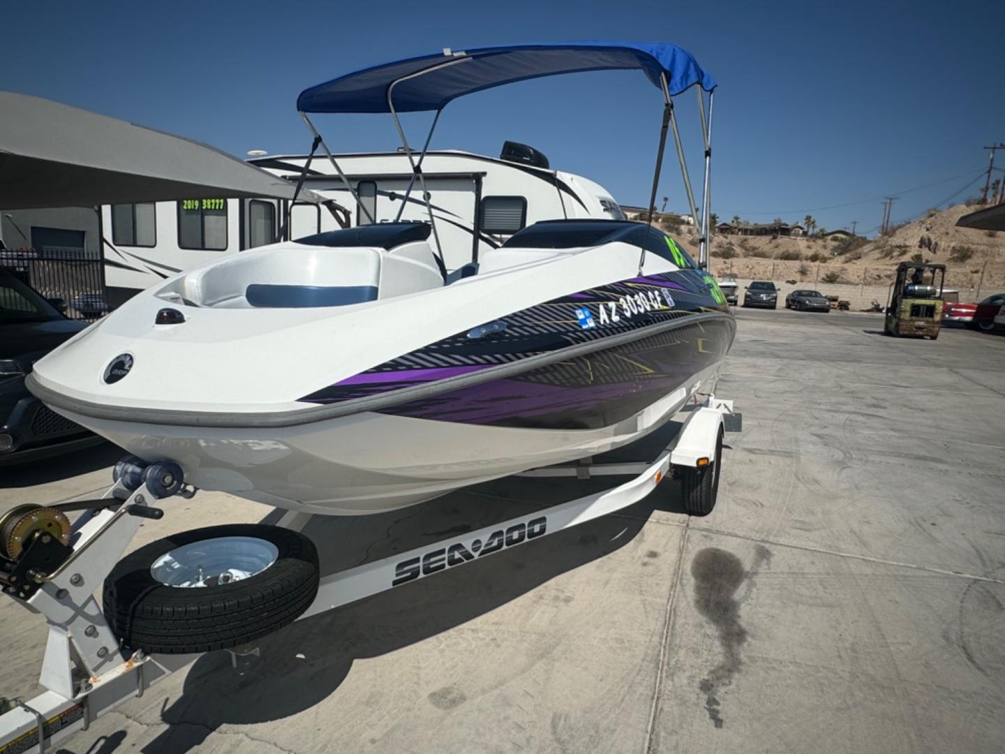 2005 White /white/blue Sea Doo Challenger 180 , located at 2190 Hwy 95, Bullhead City, AZ, 86442, (928) 704-0060, 0.000000, 0.000000 - on consignment. 2005 Sea Doo Challenger 180. 18ft with 4 tech 4 stroke engine. runs and drives great. only 86 hours. That's right 86 hours on the engine. Recently serviced. newer bimini top . stereo custom decals. spare tire. free and clear title for boat and trailer. - Photo#11