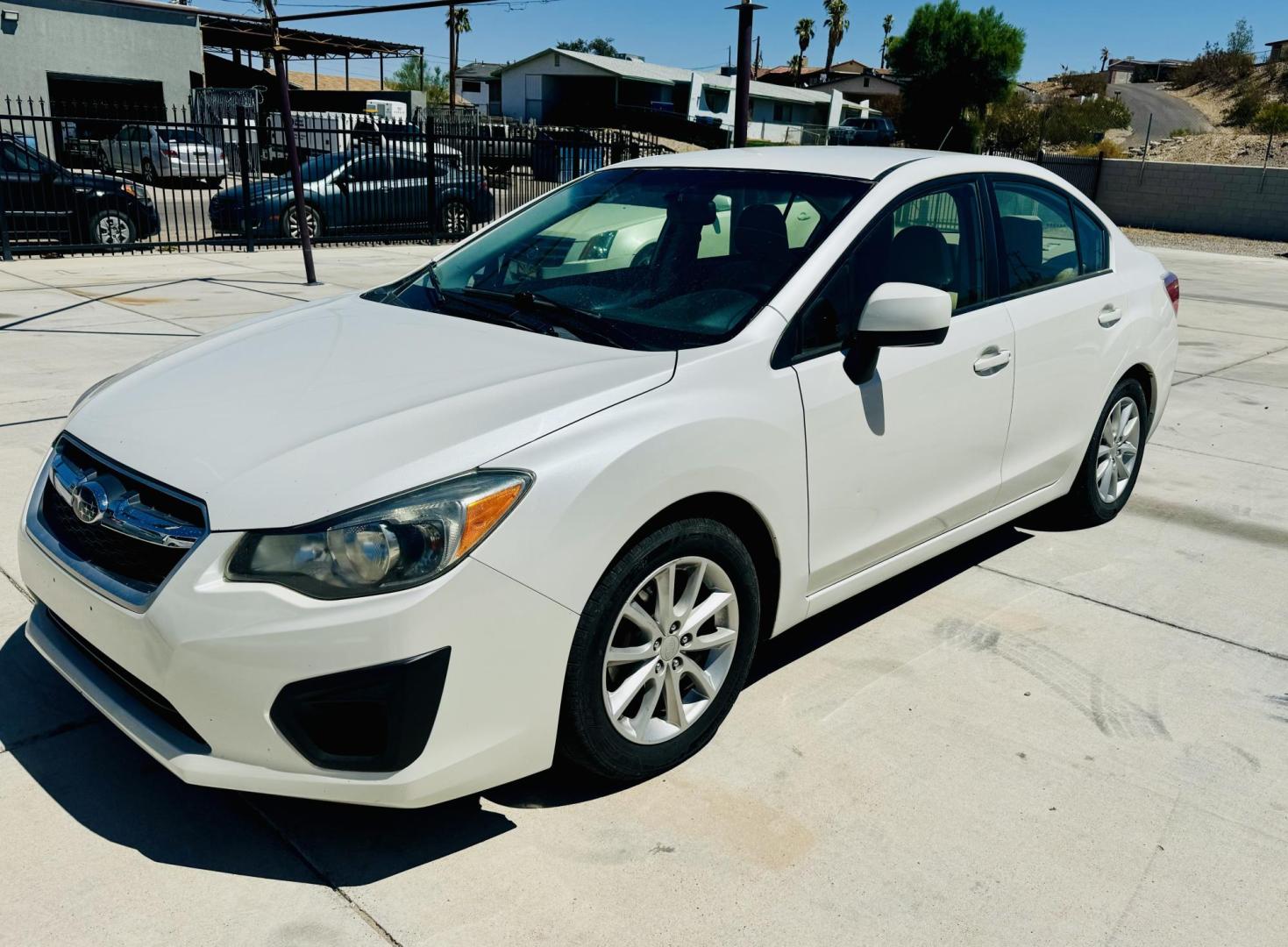 2013 Subaru Impreza 2.0i Premium 4-Door w/All Weather Package (JF1GJAC69DH) with an 2.0L H4 DOHC 16V engine, Continuously Variable Transmission transmission, located at 2190 Hwy 95, Bullhead City, AZ, 86442, (928) 704-0060, 0.000000, 0.000000 - Photo#0