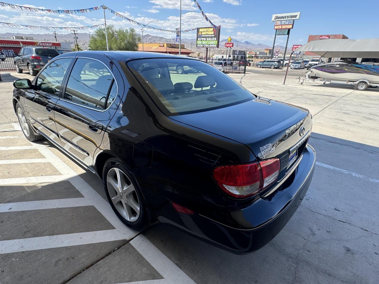 2002 Infiniti I35 Luxury (JNKDA31A12T) with an 3.5L V6 DOHC 24V engine, 4-Speed Automatic Overdrive transmission, located at 2190 Hwy 95, Bullhead City, AZ, 86442, (928) 704-0060, 0.000000, 0.000000 - Photo#1