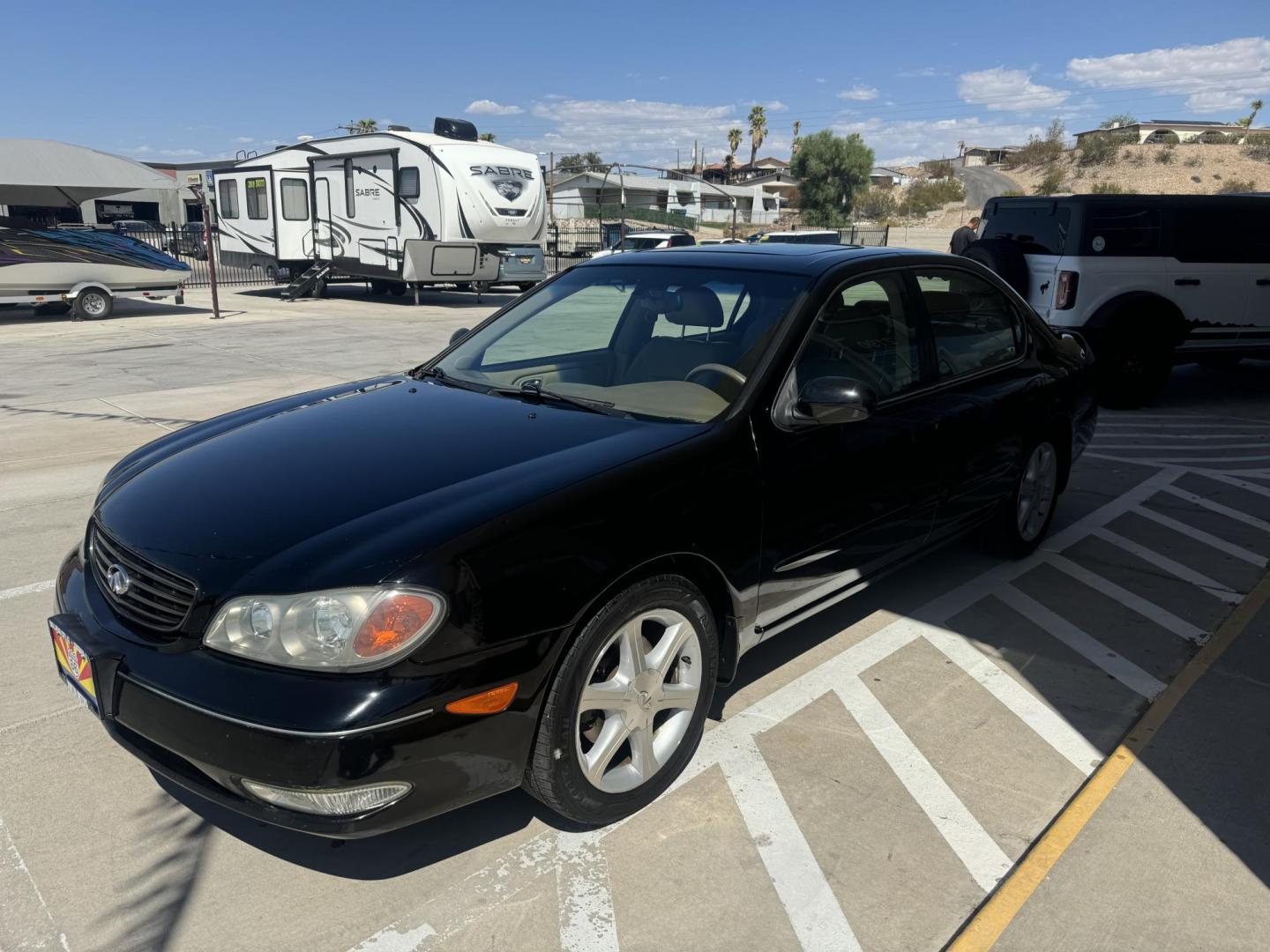 2002 Infiniti I35 Luxury (JNKDA31A12T) with an 3.5L V6 DOHC 24V engine, 4-Speed Automatic Overdrive transmission, located at 2190 Hwy 95, Bullhead City, AZ, 86442, (928) 704-0060, 0.000000, 0.000000 - Photo#2