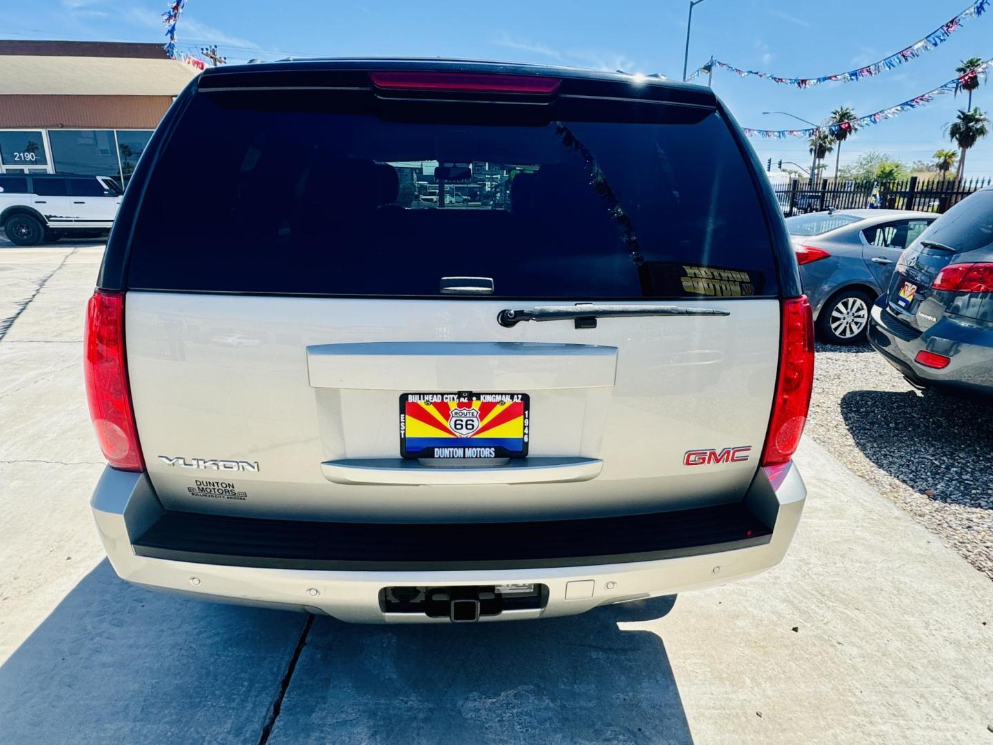 2014 /black GMC Yukon SLT 2WD (1GKS1CE00ER) with an 5.3L V8 OHV 16V FFV engine, 6-Speed Automatic transmission, located at 2190 Hwy 95, Bullhead City, AZ, 86442, (928) 704-0060, 0.000000, 0.000000 - 2014 GMC Yukon SLT. Leather , loaded. 3rd row seating, tow package, backup camera , . 2 owner clean carfax. Only 84,000 miles. Brand new tires. Free warranty. Free carfax. 5.3 V8. financing available for qualified buyers - Photo#3