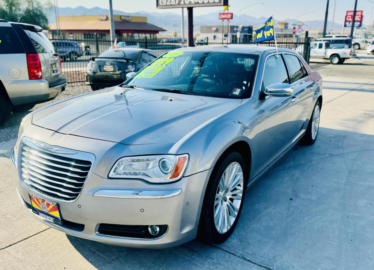 2011 Silver Chrysler 300 , located at 2190 Hwy 95, Bullhead City, AZ, 86442, (928) 704-0060, 0.000000, 0.000000 - 2011 Chrysler 300. leather loaded, 93k miles. 5.7 V8. automatic.bluetooth, backu camera, free carfax, free warranty - Photo#2