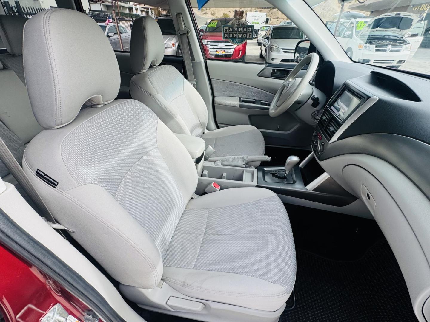 2011 Red Subaru Forester 2.5X (JF2SHAAC5BH) with an 2.5L H4 SOHC 16V engine, 4-Speed Automatic transmission, located at 2190 Hwy 95, Bullhead City, AZ, 86442, (928) 704-0060, 0.000000, 0.000000 - 2011 Subaru forester 2.5 X. All wheel drive. Only 106k miles. In house financing available. Buy here pay here. We finance. Free warranty. Free carfax. super clean . Brand new tires. - Photo#15