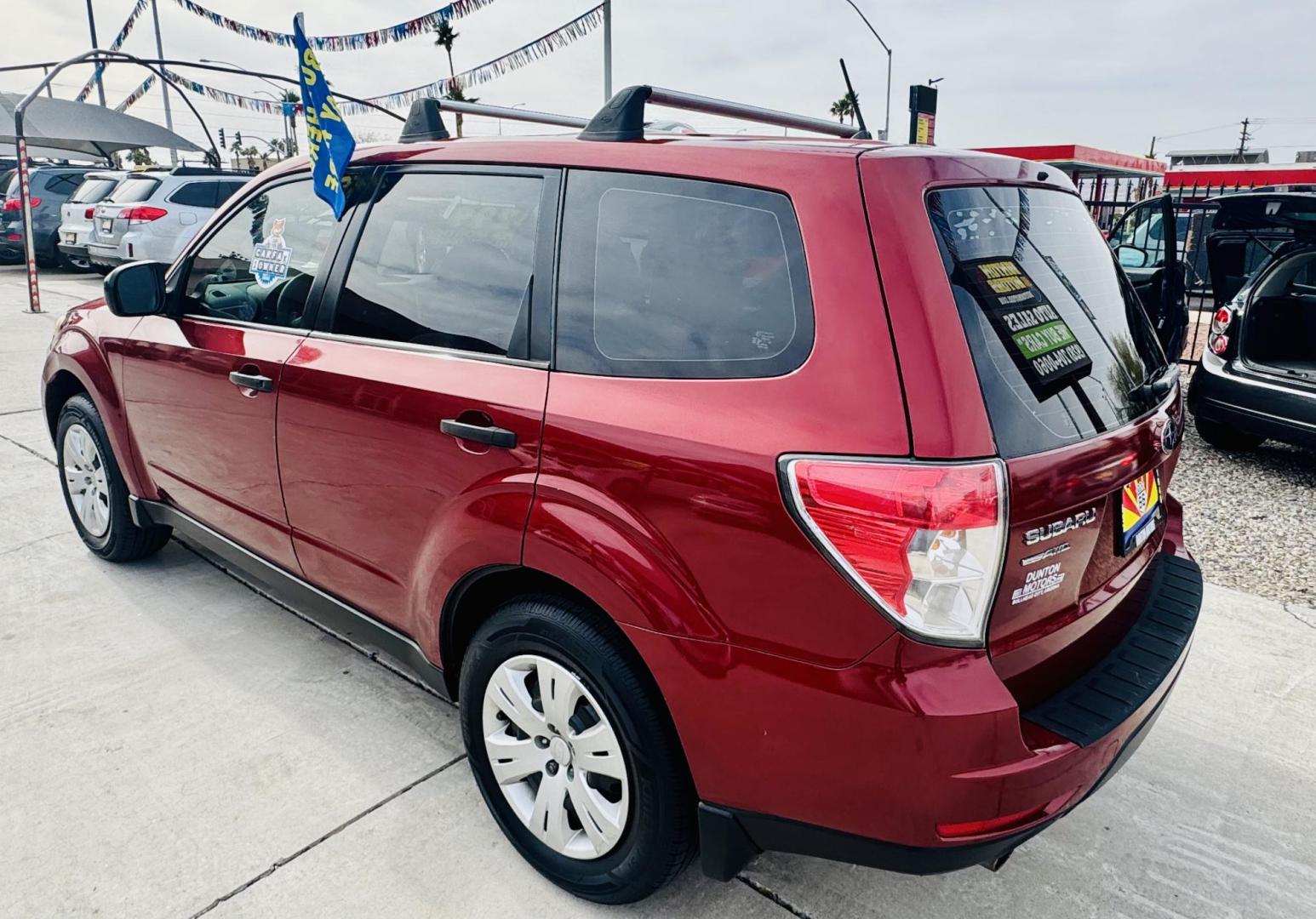 2011 Red Subaru Forester 2.5X (JF2SHAAC5BH) with an 2.5L H4 SOHC 16V engine, 4-Speed Automatic transmission, located at 2190 Hwy 95, Bullhead City, AZ, 86442, (928) 704-0060, 0.000000, 0.000000 - 2011 Subaru forester 2.5 X. All wheel drive. Only 106k miles. In house financing available. Buy here pay here. We finance. Free warranty. Free carfax. super clean . Brand new tires. - Photo#4