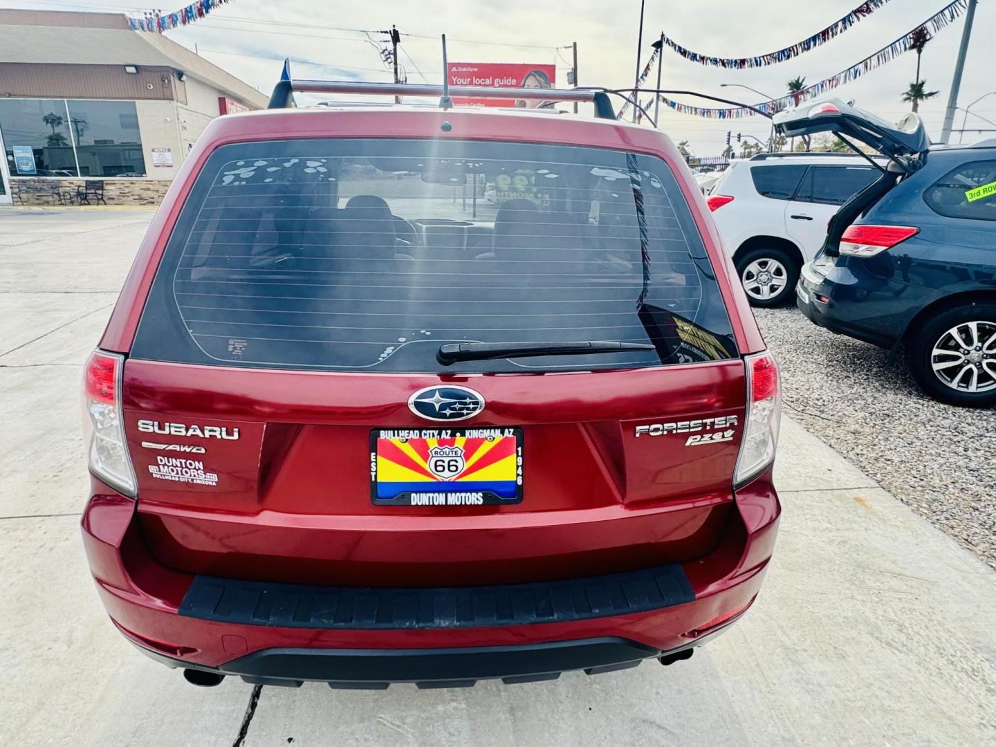 2011 Red Subaru Forester 2.5X (JF2SHAAC5BH) with an 2.5L H4 SOHC 16V engine, 4-Speed Automatic transmission, located at 2190 Hwy 95, Bullhead City, AZ, 86442, (928) 704-0060, 0.000000, 0.000000 - 2011 Subaru forester 2.5 X. All wheel drive. Only 106k miles. In house financing available. Buy here pay here. We finance. Free warranty. Free carfax. super clean . Brand new tires. - Photo#5