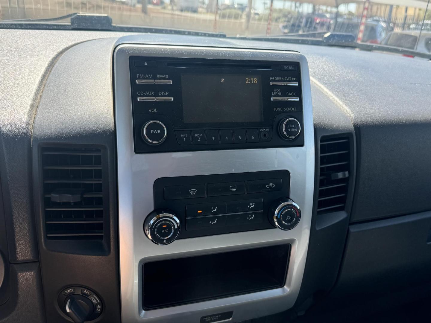 2014 grey Nissan Titan PRO-4X Crew Cab 4WD SWB (1N6AA0EC6EN) with an 5.6L V8 DOHC 32V engine, 5-Speed Automatic transmission, located at 2190 Hwy 95, Bullhead City, AZ, 86442, (928) 704-0060, 0.000000, 0.000000 - 2014 Nissan Titan crew cab 4x4. 2 owner. excellent condition. automatic, power windows, locks, tires in great shape. non smoker always garaged. elderly owned. has foldable cover for bed and carpeted bed mat. tow package. ice cold ac. just recently had complete service and all fluids changed. free an - Photo#7