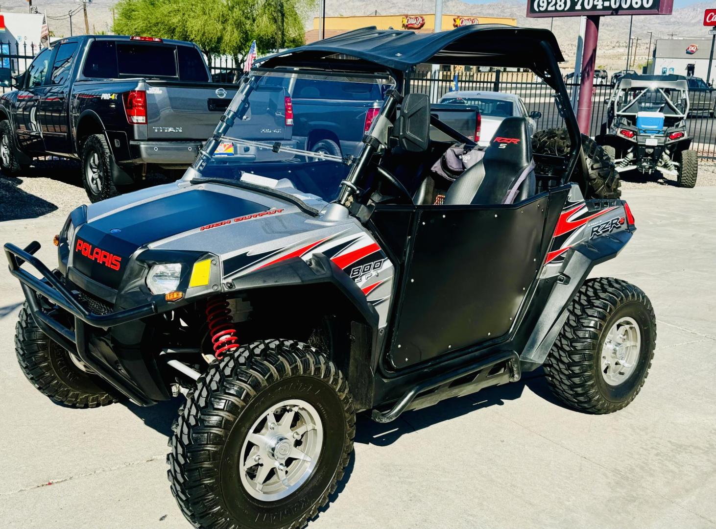 2009 Black Polaris Rzr 800 - (4XAVH76A89D) , located at 2190 Hwy 95, Bullhead City, AZ, 86442, (928) 704-0060, 0.000000, 0.000000 - On consignment. 2009 Polaris RZr 800. 1 owner . elderly owned. 3150 miles. hard top,custom hard doors. windshield. spare tire mount, spare tire. tool box. lots of extras. new set of tires also extra set. runs and drives great. Super clean. always garaged. - Photo#0