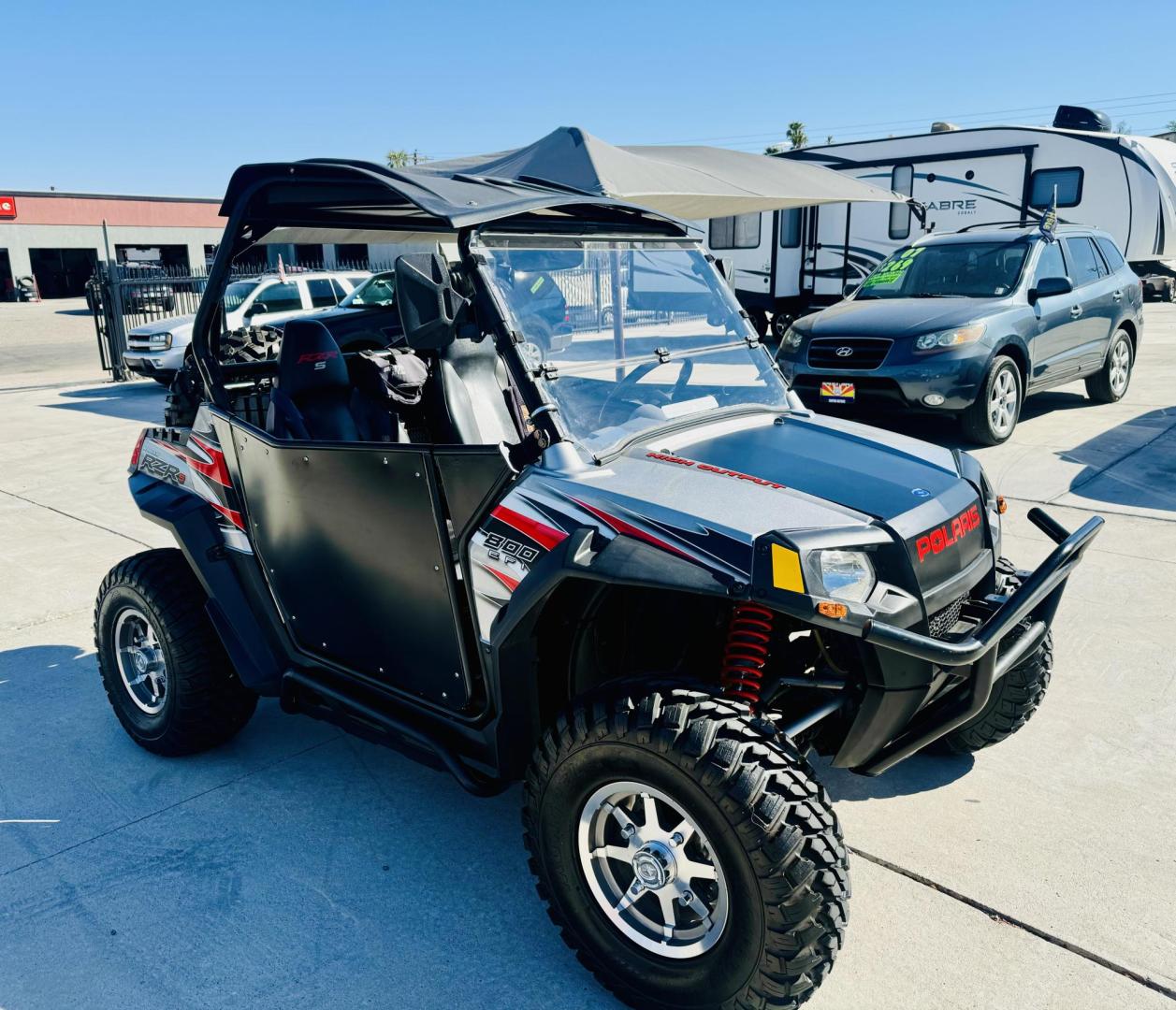 2009 Black Polaris Rzr 800 - (4XAVH76A89D) , located at 2190 Hwy 95, Bullhead City, AZ, 86442, (928) 704-0060, 0.000000, 0.000000 - On consignment. 2009 Polaris RZr 800. 1 owner . elderly owned. 3150 miles. hard top,custom hard doors. windshield. spare tire mount, spare tire. tool box. lots of extras. new set of tires also extra set. runs and drives great. Super clean. always garaged. - Photo#3