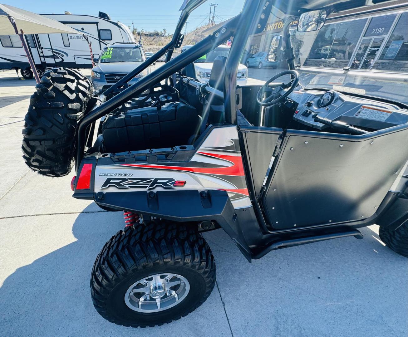 2009 Black Polaris Rzr 800 - (4XAVH76A89D) , located at 2190 Hwy 95, Bullhead City, AZ, 86442, (928) 704-0060, 0.000000, 0.000000 - On consignment. 2009 Polaris RZr 800. 1 owner . elderly owned. 3150 miles. hard top,custom hard doors. windshield. spare tire mount, spare tire. tool box. lots of extras. new set of tires also extra set. runs and drives great. Super clean. always garaged. - Photo#8