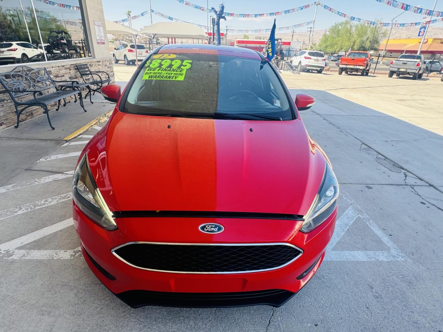 2015 Red Ford Focus SE Sedan (1FADP3F27FL) with an 2.0L L4 DOHC 16V engine, located at 2190 Hwy 95, Bullhead City, AZ, 86442, (928) 704-0060, 0.000000, 0.000000 - Photo#5