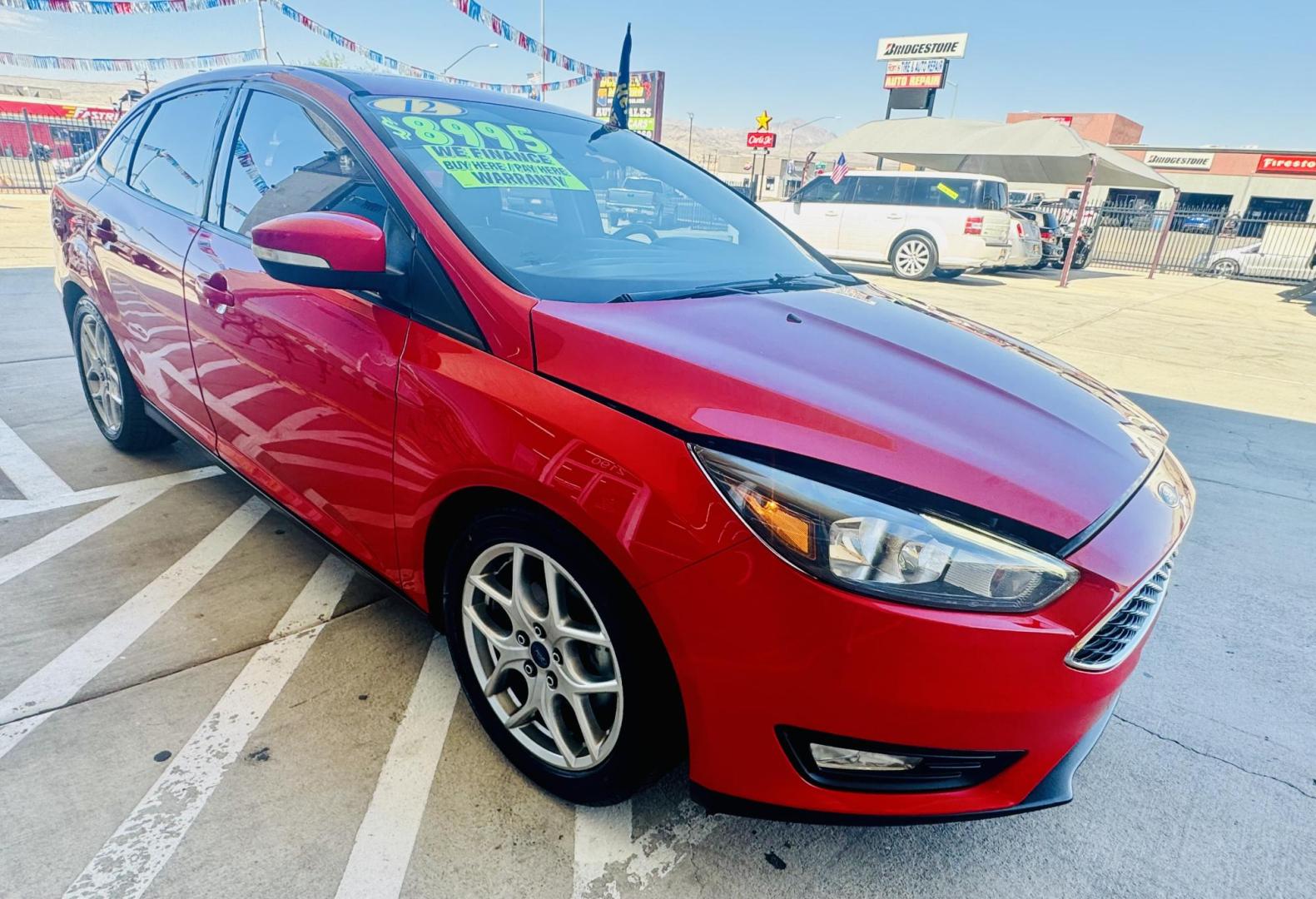 2015 Red Ford Focus SE Sedan (1FADP3F27FL) with an 2.0L L4 DOHC 16V engine, located at 2190 Hwy 95, Bullhead City, AZ, 86442, (928) 704-0060, 0.000000, 0.000000 - Photo#6