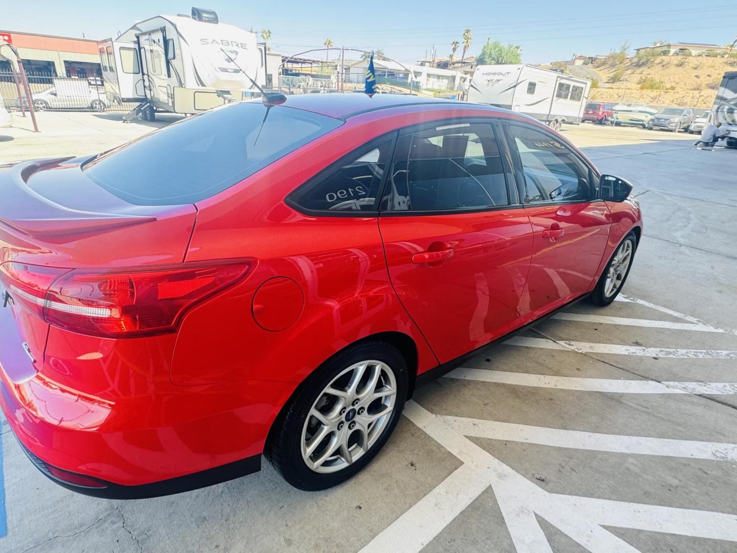 2015 Red Ford Focus SE Sedan (1FADP3F27FL) with an 2.0L L4 DOHC 16V engine, located at 2190 Hwy 95, Bullhead City, AZ, 86442, (928) 704-0060, 0.000000, 0.000000 - Photo#8