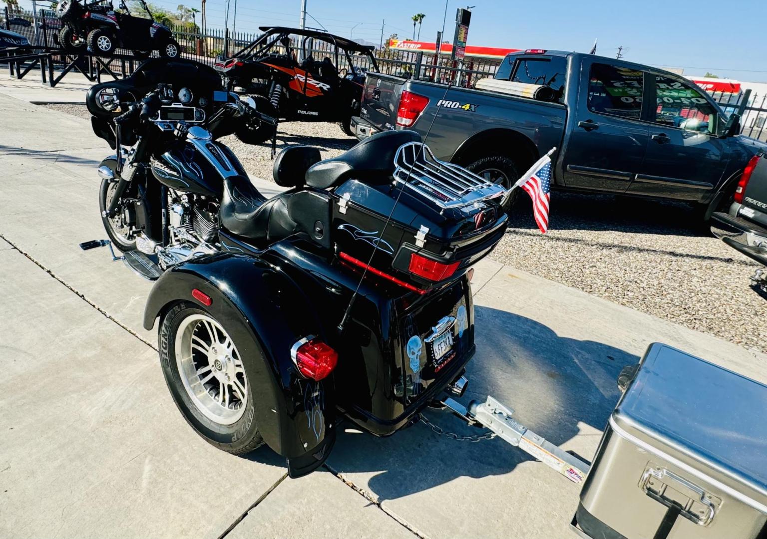 2010 Black /black Harley-Davidson FLHXXX - (1HD1MBM37AB) , located at 2190 Hwy 95, Bullhead City, AZ, 86442, (928) 704-0060, 0.000000, 0.000000 - 2010 Harley Davidson trike with trailer. custom. super clean . lots of extras, 38k miles. always garaged. has full dresser, radio, full windshield. full cover . dyno jet tuner. custom pin striping. this bikes a looker. custom trailer to match. $17900 o.b.o. free and clear titles for both. - Photo#5