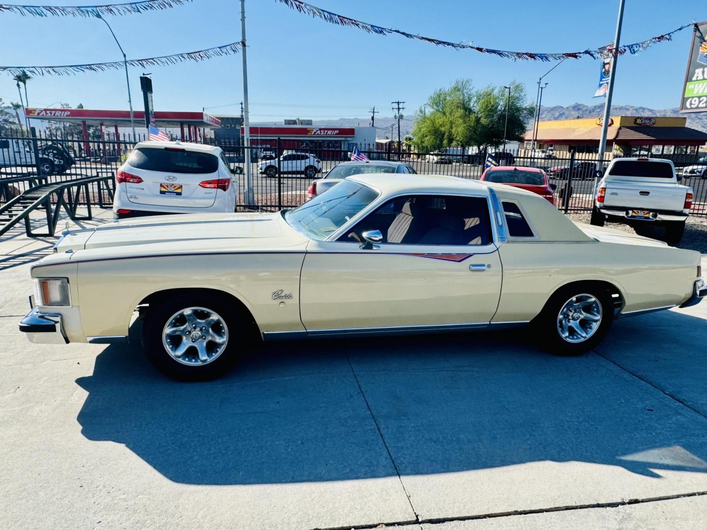 1979 yellow /tan Chrysler Cordoba , located at 2190 Hwy 95, Bullhead City, AZ, 86442, (928) 704-0060, 0.000000, 0.000000 - 1979 Chrysler Cordoba 360 v-8. automatic 3 speed. power windows, power door locks. vinyl half hard top half roof. rare car. cloth original interior. power seats. fatory ice cold a/c. lots of new parts. new tires. all fluids, belts, hoses, brakes, new carbeurator. 73k original miles. - Photo#3