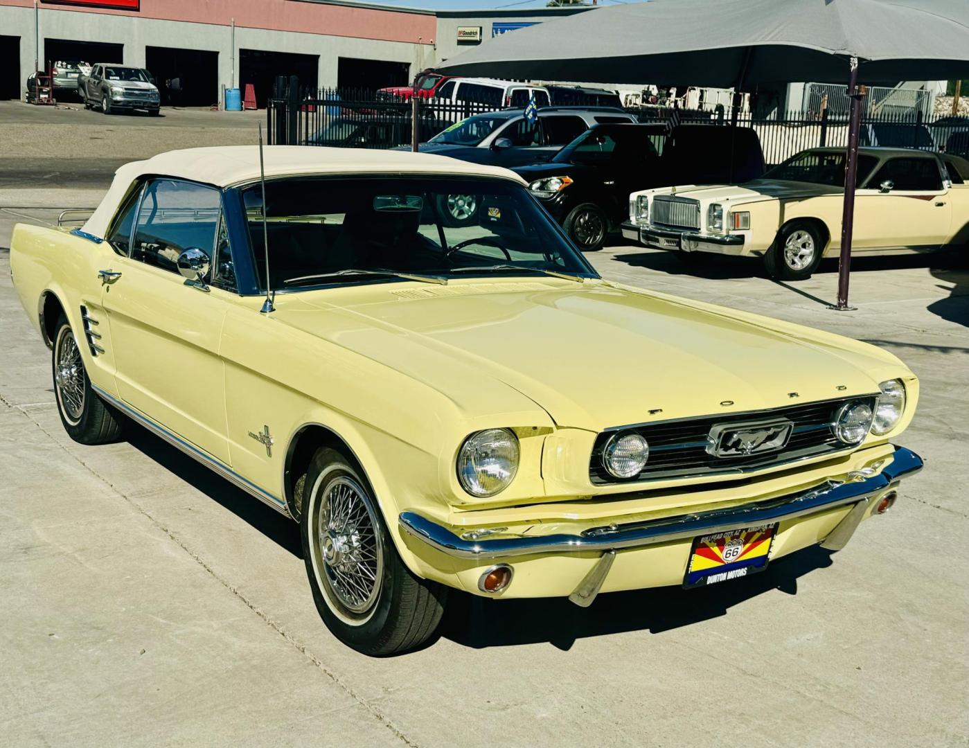 1966 yellow /black Ford Mustang (6F08T296715) , located at 2190 Hwy 95, Bullhead City, AZ, 86442, (928) 704-0060, 0.000000, 0.000000 - On consigment. This beautiful rare 1966 Ford Mustang. Automatic convertible. 200 ci inline 6 engine. Only 63,000 original miles. Lots of paperwork, document, service history etc. Meticuloulsly cared for . Always garaged. Brand new top. original car. Original paint, original interior. Beautiful Sprin - Photo#3