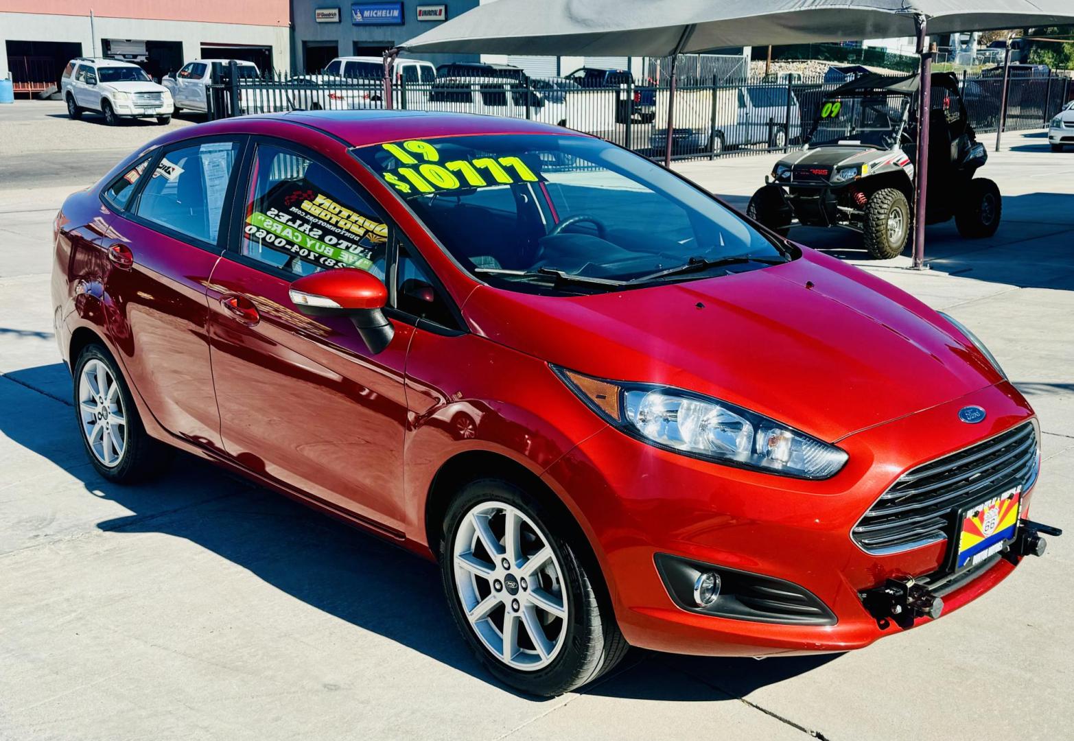 2019 Red Ford Fiesta SE Sedan (3FADP4BJ8KM) with an 1.6L L4 DOHC 16V engine, located at 2190 Hwy 95, Bullhead City, AZ, 86442, (928) 704-0060, 0.000000, 0.000000 - On consignment. This super clean tow behind Ford Fiesta SE. Manual transmission. Tow behind set up included. Moonroof, backup camera, bluetooth, keyless entry, power windows, locks. cold ac. rear spoiler. 2 owner, clean carfax. Financing available. - Photo#0