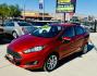 2019 Red Ford Fiesta SE Sedan (3FADP4BJ8KM) with an 1.6L L4 DOHC 16V engine, located at 2190 Hwy 95, Bullhead City, AZ, 86442, (928) 704-0060, 0.000000, 0.000000 - On consignment. This super clean tow behind Ford Fiesta SE. Manual transmission. Tow behind set up included. Moonroof, backup camera, bluetooth, keyless entry, power windows, locks. cold ac. rear spoiler. 2 owner, clean carfax. Financing available. - Photo#1