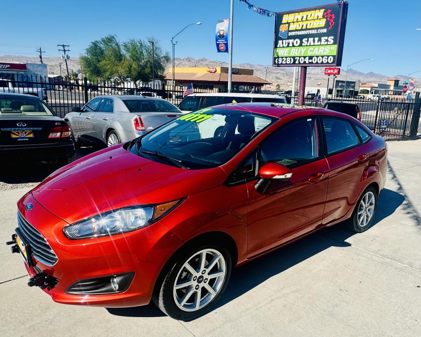 2019 Red Ford Fiesta SE Sedan (3FADP4BJ8KM) with an 1.6L L4 DOHC 16V engine, located at 2190 Hwy 95, Bullhead City, AZ, 86442, (928) 704-0060, 0.000000, 0.000000 - On consignment. This super clean tow behind Ford Fiesta SE. Manual transmission. Tow behind set up included. Moonroof, backup camera, bluetooth, keyless entry, power windows, locks. cold ac. rear spoiler. 2 owner, clean carfax. Financing available. - Photo#3