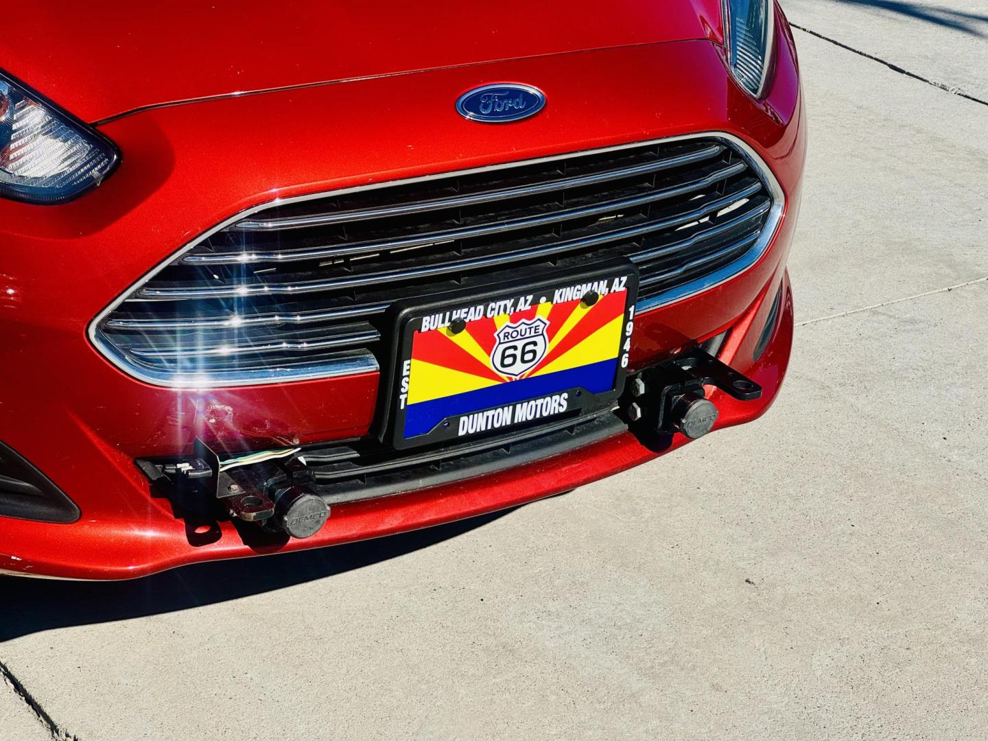 2019 Red Ford Fiesta SE Sedan (3FADP4BJ8KM) with an 1.6L L4 DOHC 16V engine, located at 2190 Hwy 95, Bullhead City, AZ, 86442, (928) 704-0060, 0.000000, 0.000000 - On consignment. This super clean tow behind Ford Fiesta SE. Manual transmission. Tow behind set up included. Moonroof, backup camera, bluetooth, keyless entry, power windows, locks. cold ac. rear spoiler. 2 owner, clean carfax. Financing available. - Photo#5