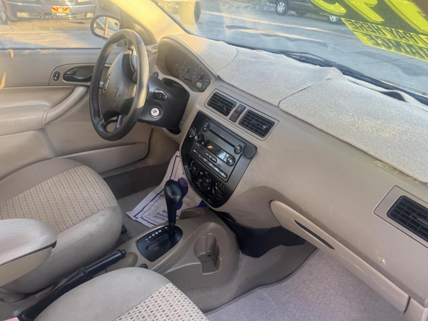 2007 Beige Ford Focus ZX4 S (1FAHP34N07W) with an 2.0L L4 DOHC 16V engine, located at 2190 Hwy 95, Bullhead City, AZ, 86442, (928) 704-0060, 0.000000, 0.000000 - 1 owner. free warranty. free carfax. Arizona car. accident Free. We finance Buy here pay here - Photo#10