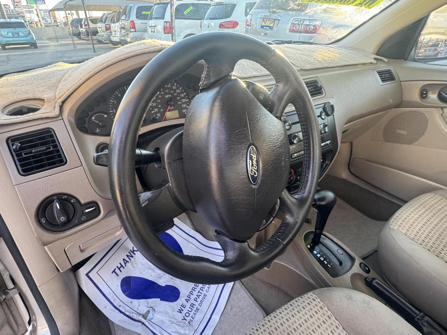 2007 Beige Ford Focus ZX4 S (1FAHP34N07W) with an 2.0L L4 DOHC 16V engine, located at 2190 Hwy 95, Bullhead City, AZ, 86442, (928) 704-0060, 0.000000, 0.000000 - 1 owner. free warranty. free carfax. Arizona car. accident Free. We finance Buy here pay here - Photo#11