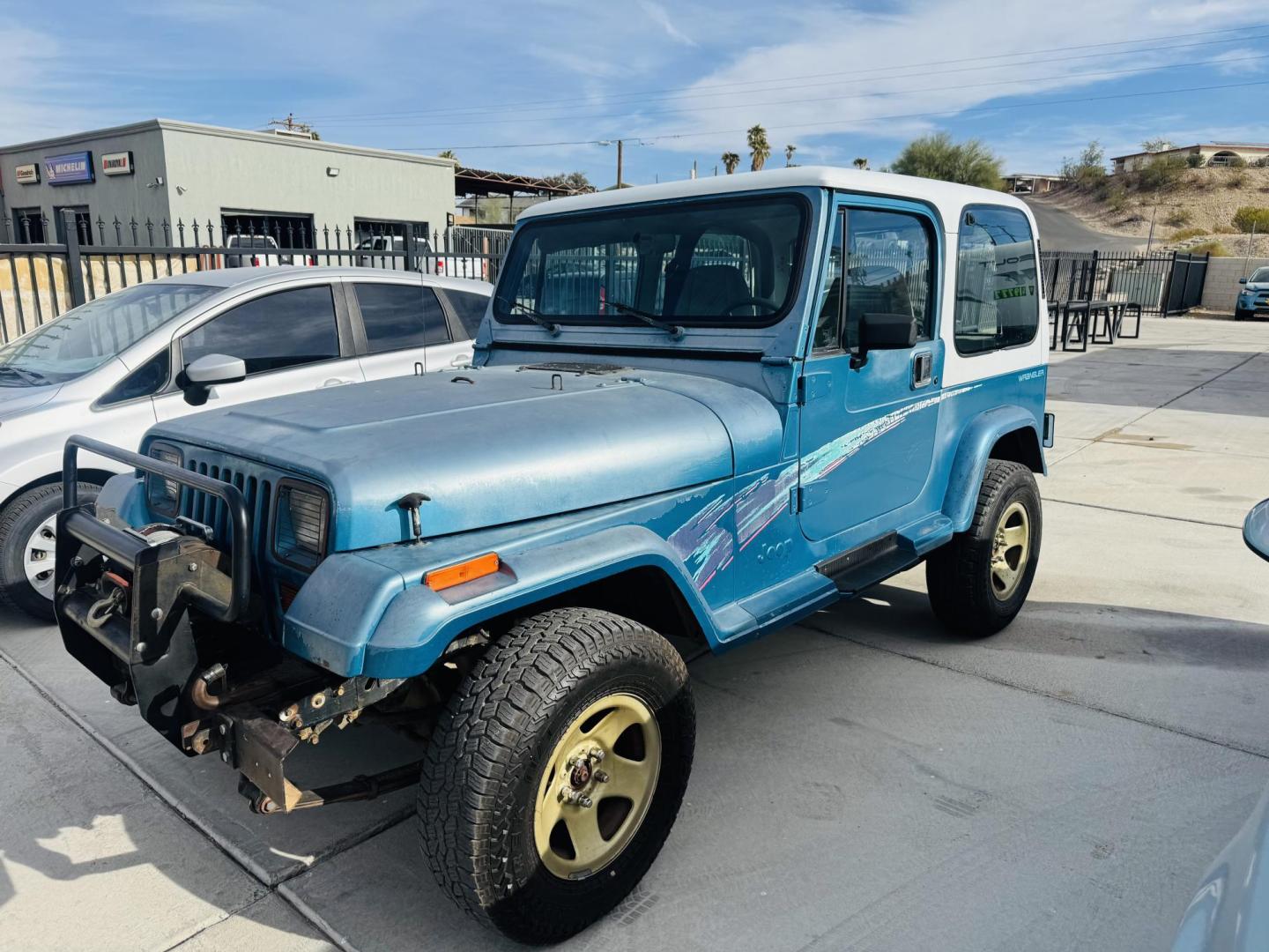 1993 blue Jeep Wrangler Base (1J4FY29S5PP) with an 4.0L L6 OHV 12V engine, located at 2190 Hwy 95, Bullhead City, AZ, 86442, (928) 704-0060, 0.000000, 0.000000 - hard top. 4.0 6 cylinder automatic. air conditioning. a true classic jeep. IN house financing. We finance. completely serviced. new battery ,tires like new ac works great. a classic jeep wrangler 4x4. - Photo#1