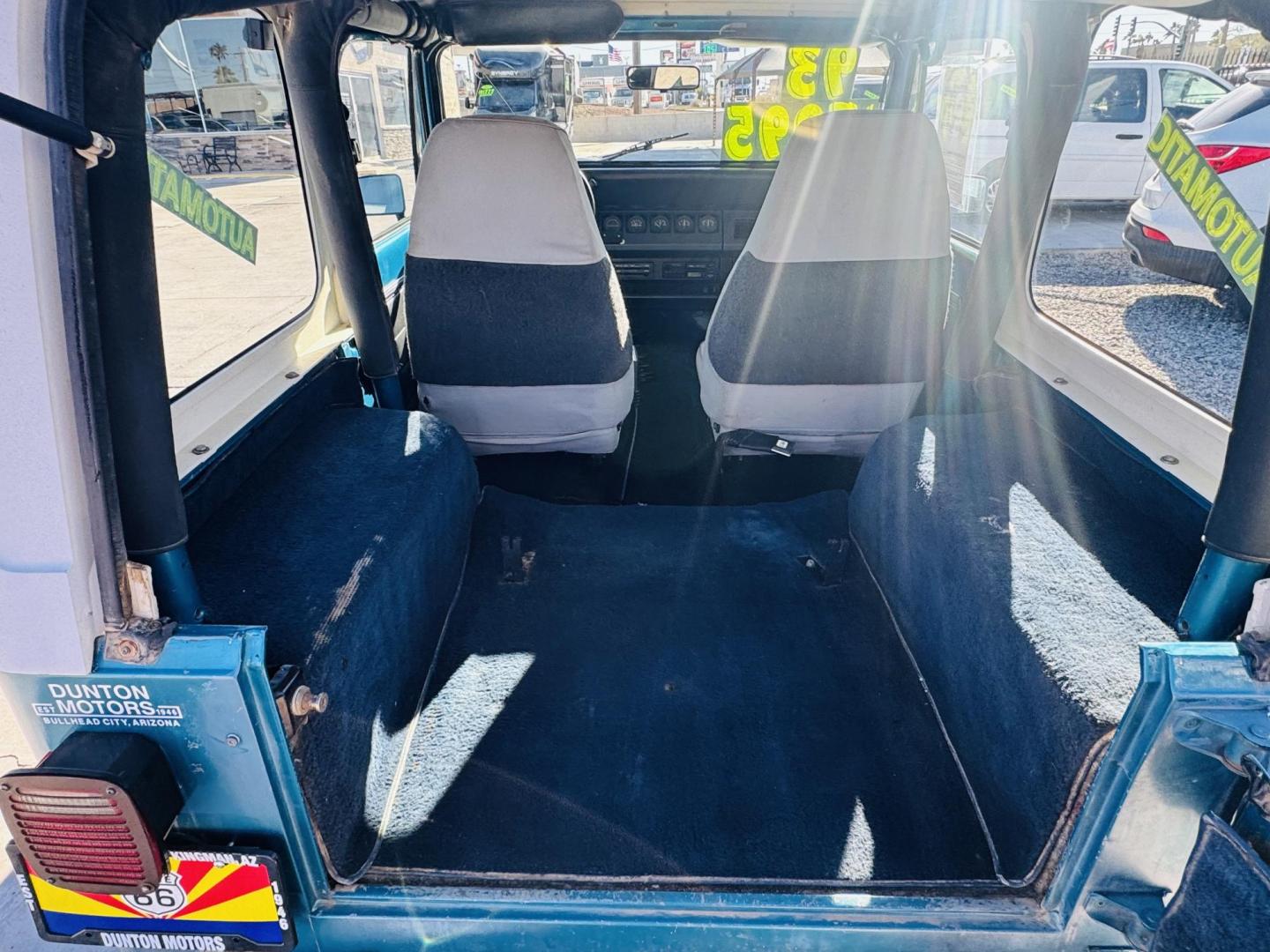 1993 blue Jeep Wrangler Base (1J4FY29S5PP) with an 4.0L L6 OHV 12V engine, located at 2190 Hwy 95, Bullhead City, AZ, 86442, (928) 704-0060, 0.000000, 0.000000 - hard top. 4.0 6 cylinder automatic. air conditioning. a true classic jeep. IN house financing. We finance. completely serviced. new battery ,tires like new ac works great. a classic jeep wrangler 4x4. - Photo#18