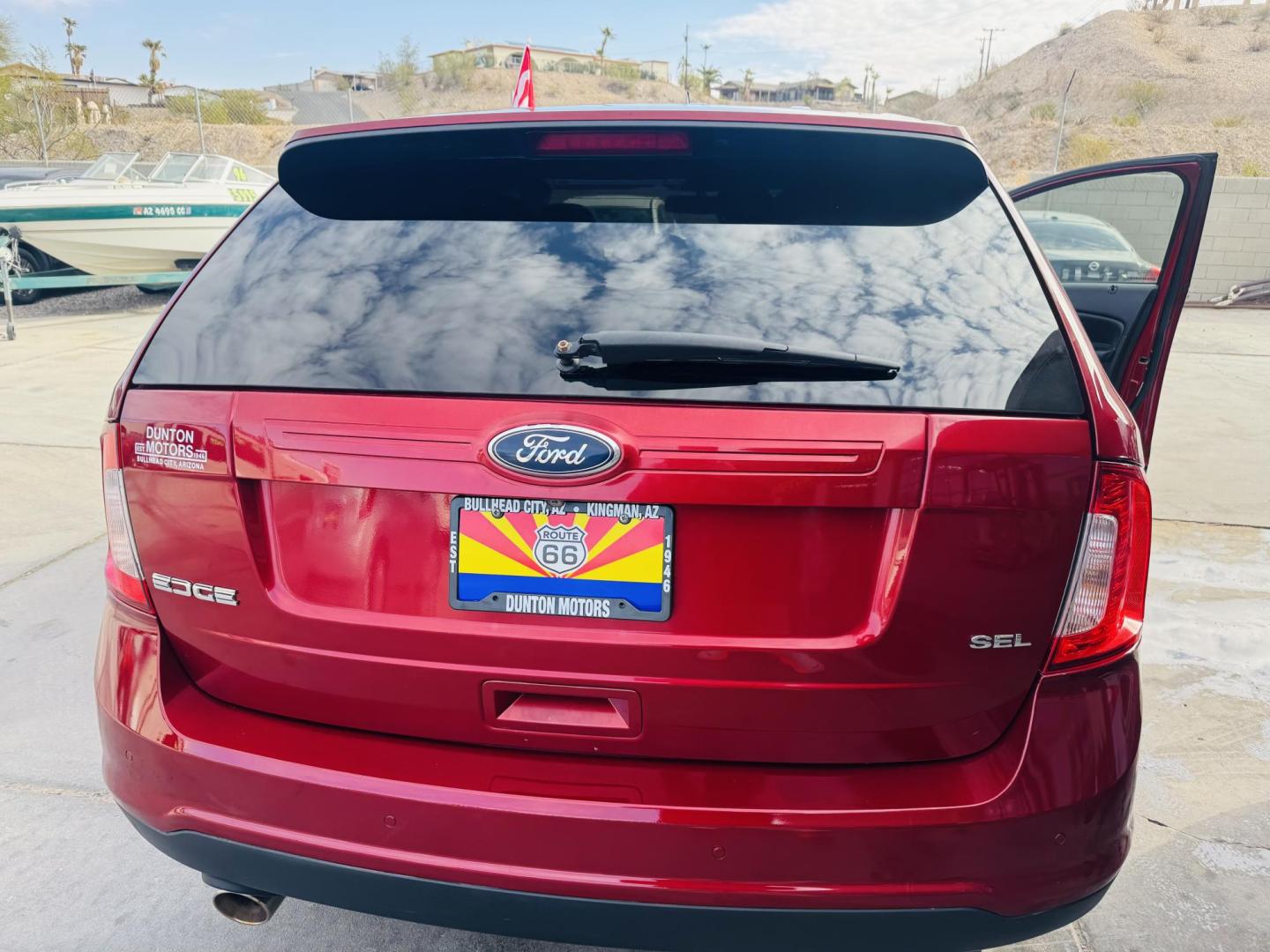 2013 Red Ford Edge SEL FWD (2FMDK3JC3DB) with an 3.5L V6 DOHC 24V engine, 6-Speed Automatic transmission, located at 2190 Hwy 95, Bullhead City, AZ, 86442, (928) 704-0060, 0.000000, 0.000000 - Photo#7