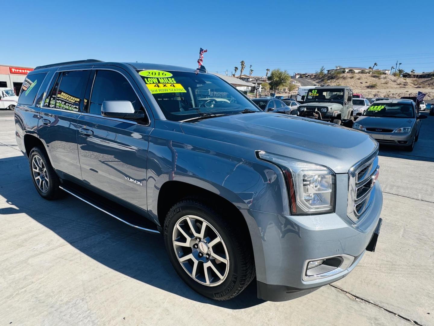 2016 Light steel grey metallic /black GMC Yukon SLT 4WD (1GKS2BKC1GR) with an 5.3L V8 OHV 16V FFV engine, 6A transmission, located at 2190 Hwy 95, Bullhead City, AZ, 86442, (928) 704-0060, 0.000000, 0.000000 - 2016 gmc Yukon SLT. 3rd row seating. only 72k miles. very low miles for the year.5.3 V8., Fully loaded 4 wheel drive.Leather loaded. heated seats, backup camera, bluetooth, satellite radio, rear power folding seats.lane assist warning. . rear heated seats and front. custom window tint all the way - Photo#1