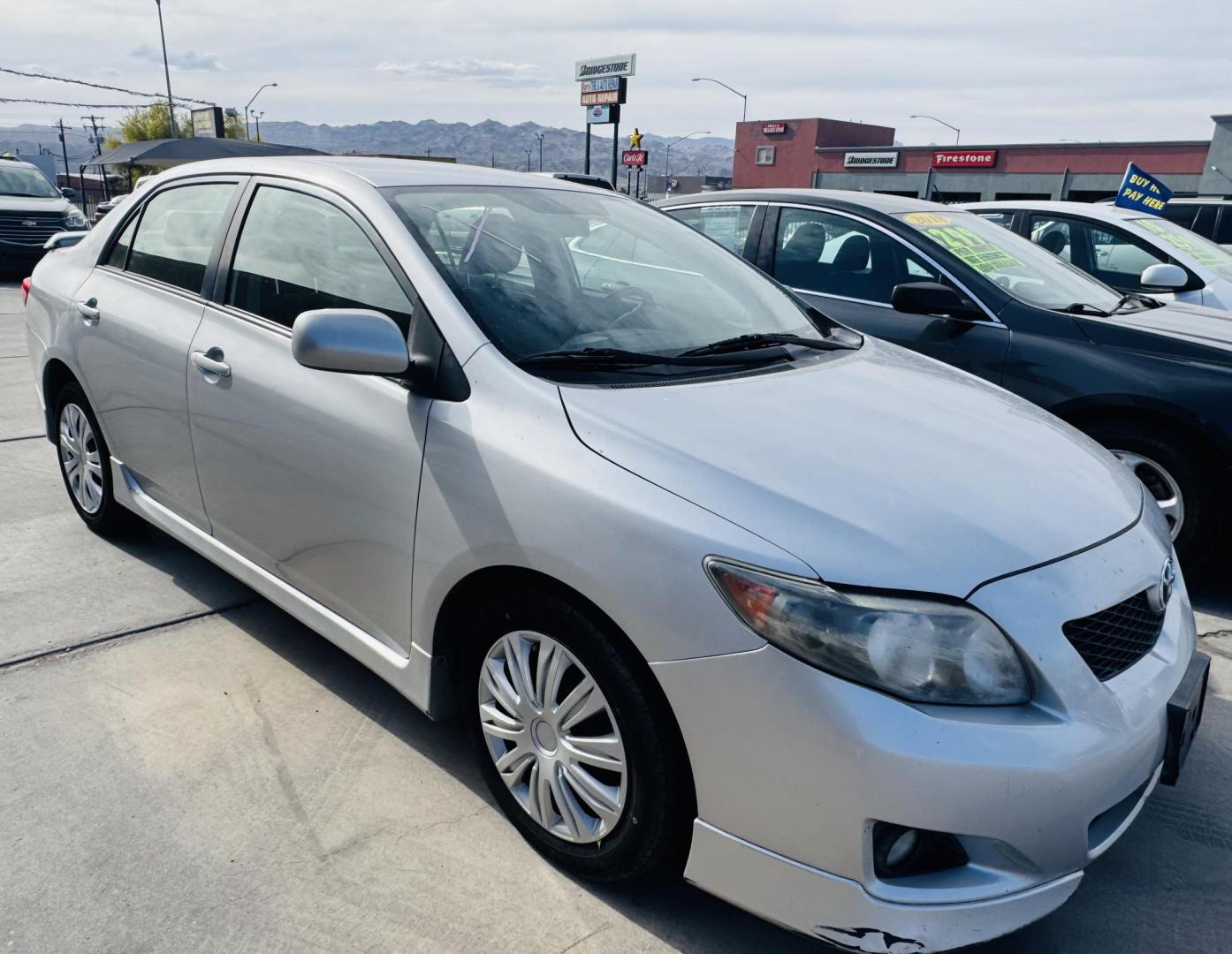 2009 Silver Toyota Corolla Base 4-Speed AT (1NXBU40E59Z) with an 1.8L L4 DOHC 16V engine, 4-Speed Automatic Overdrive transmission, located at 2190 Hwy 95, Bullhead City, AZ, 86442, (928) 704-0060, 0.000000, 0.000000 - 1 owner. 4 speed manual trans. lowered body kid. runs and drives great. free warranty. free carfax. *1 owner arizona car. great gas mileage. fun to drive. - Photo#0
